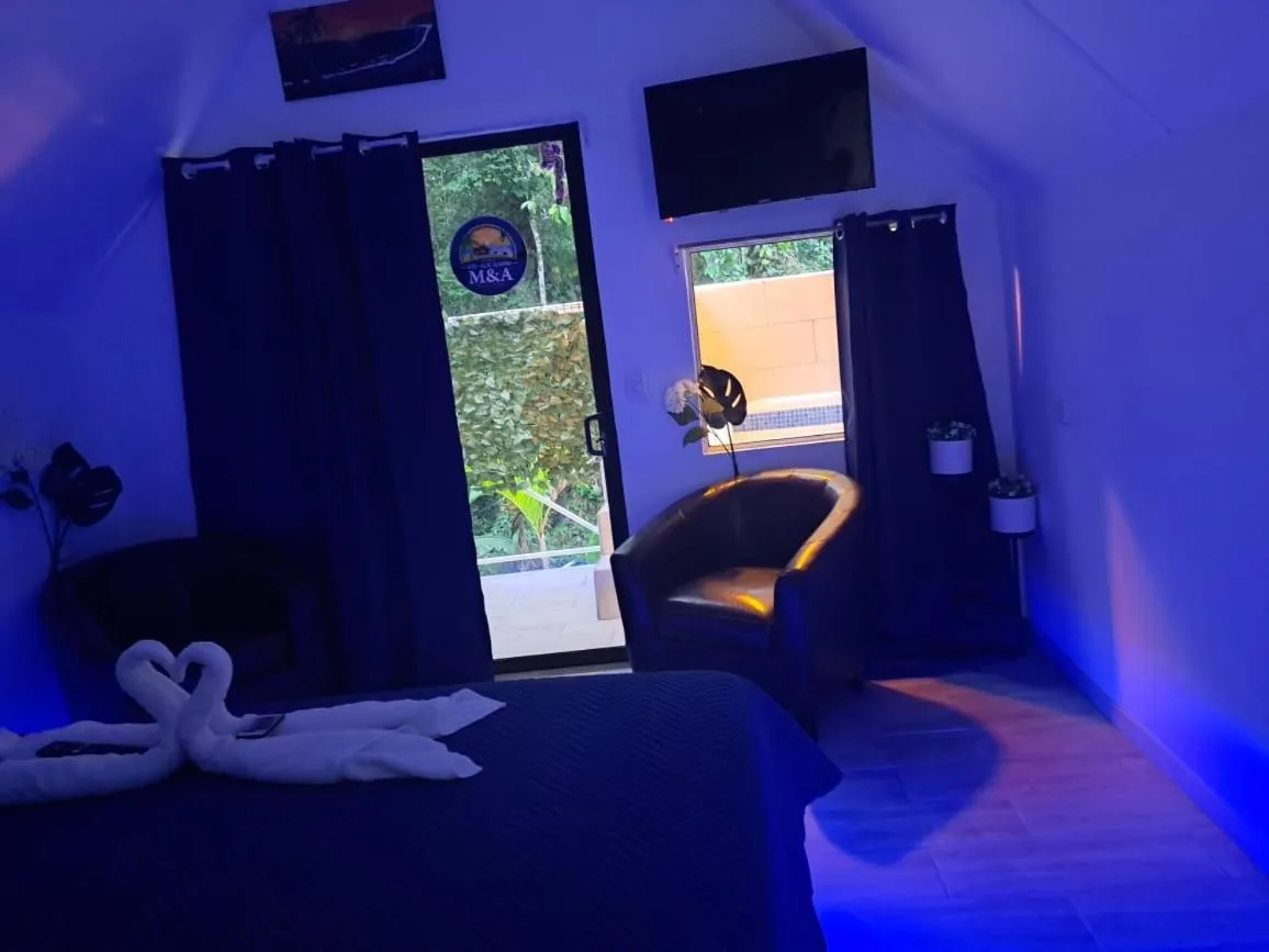 Photo of the whole room, Bed in HOTEL, VILLAS y GLAMPINGS MYA -PUERTO VIEJO, Limon, CR