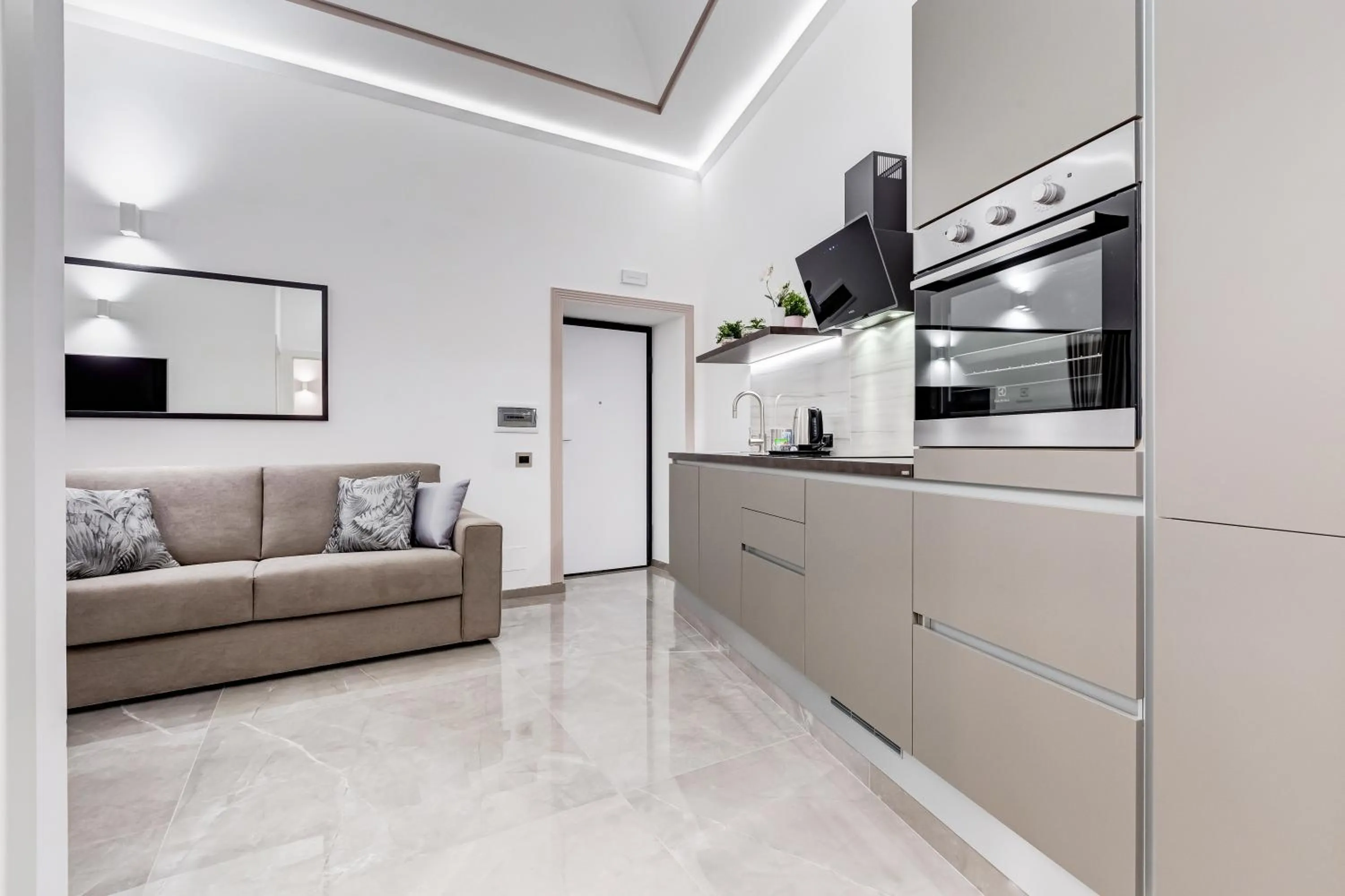 Kitchen or kitchenette in UnoSeiTre - Luxury Apartment & Suite