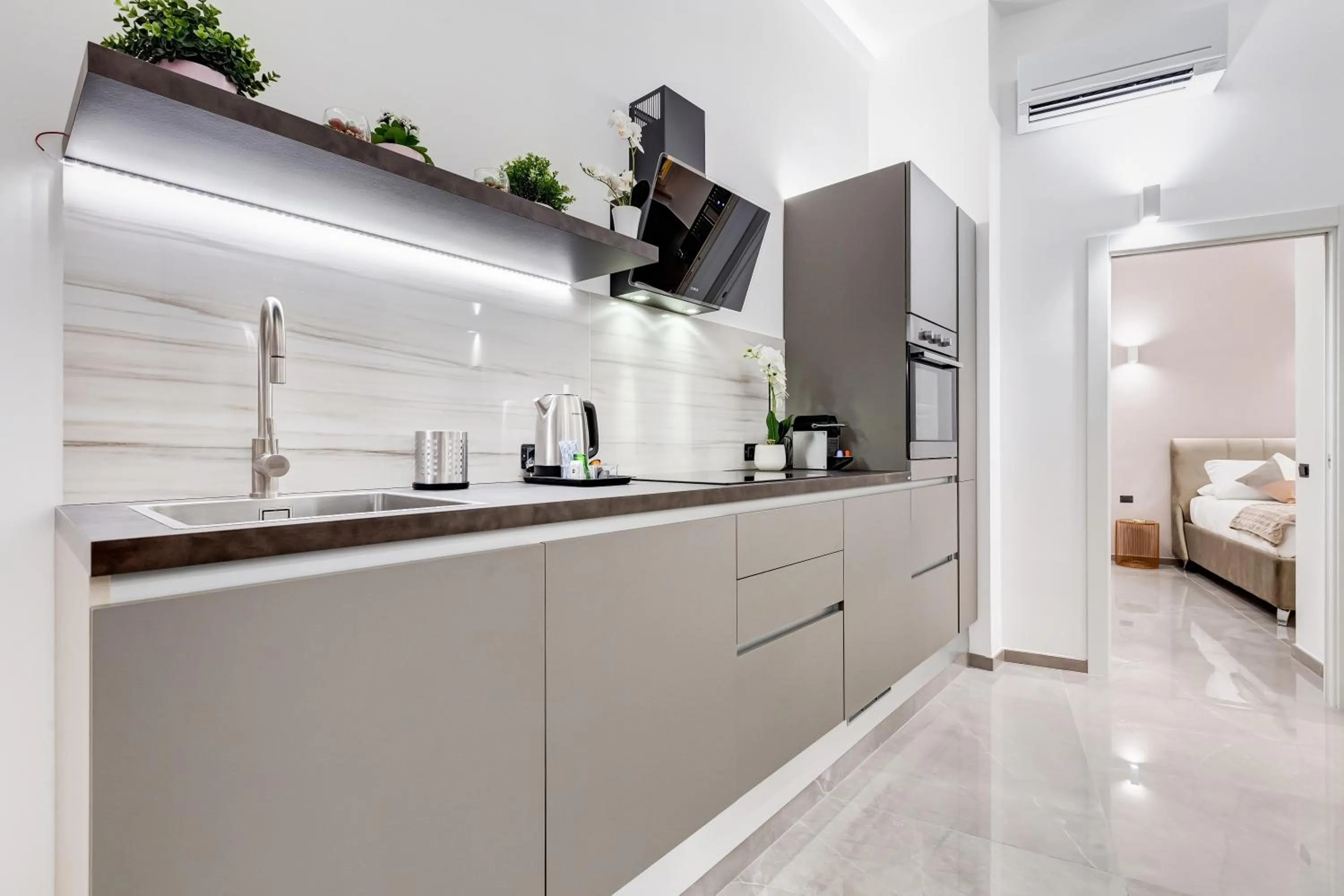 Kitchen or kitchenette in UnoSeiTre - Luxury Apartment & Suite