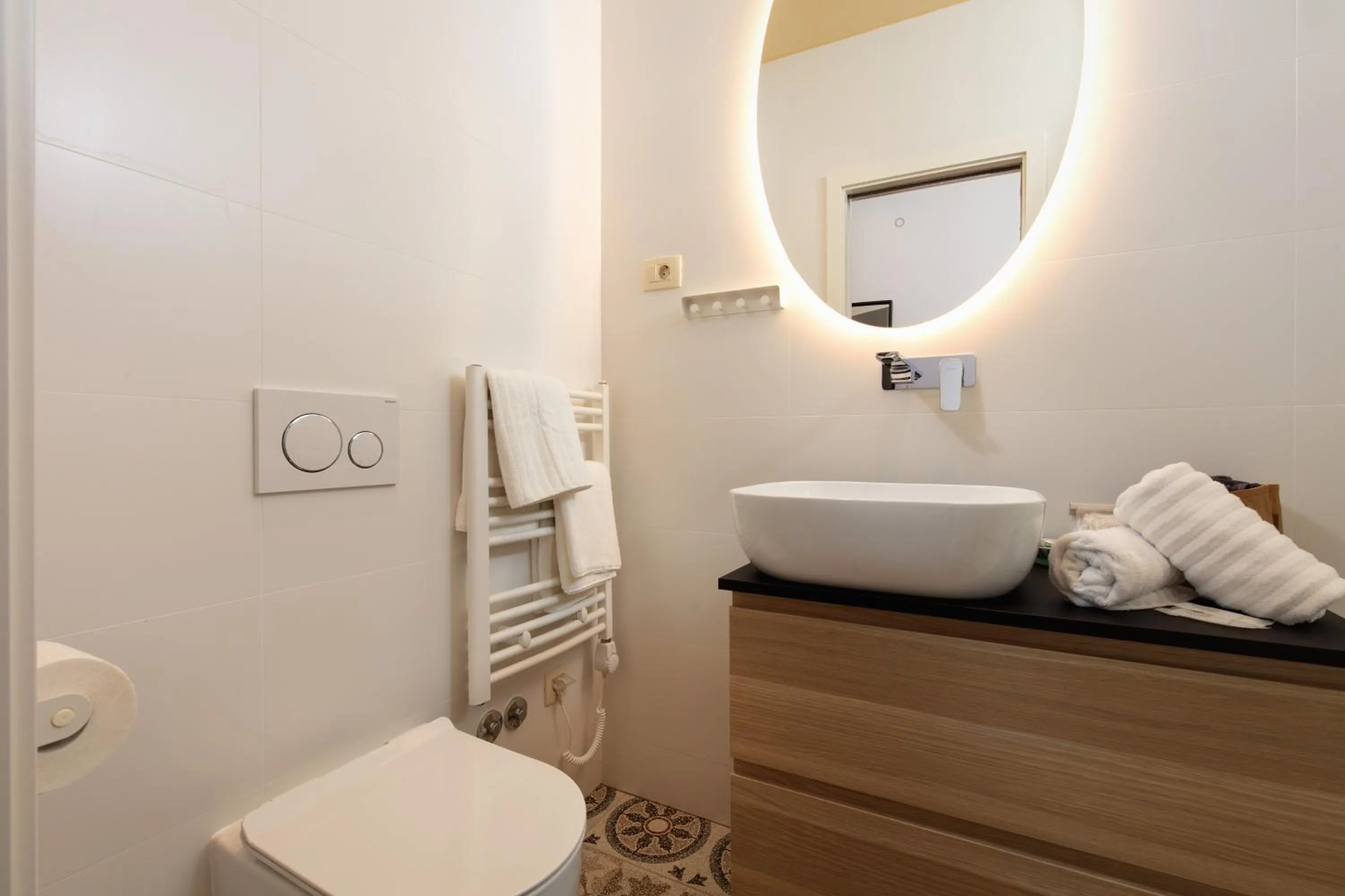 Toilet, Bed in Aborda Rooms