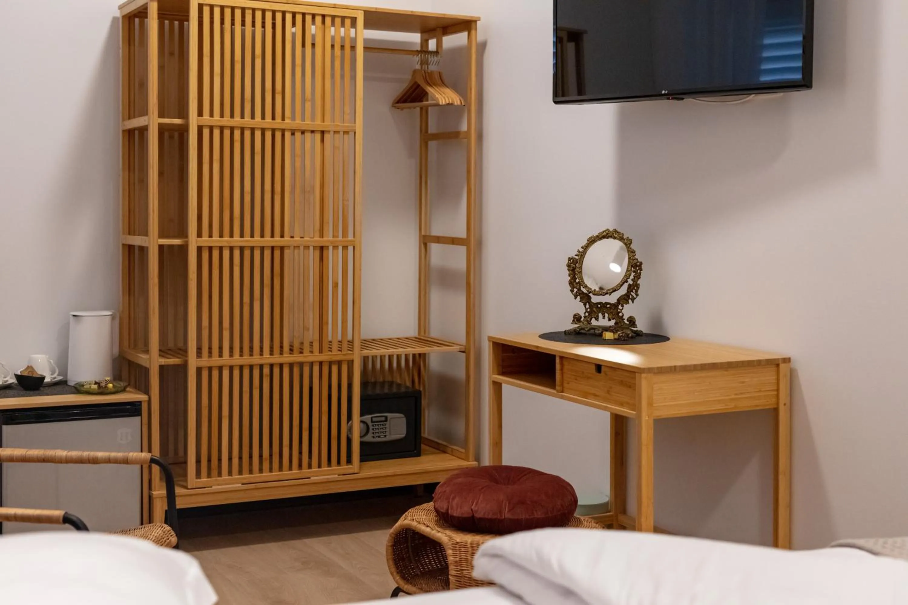 Seating area, Bed in Aborda Rooms