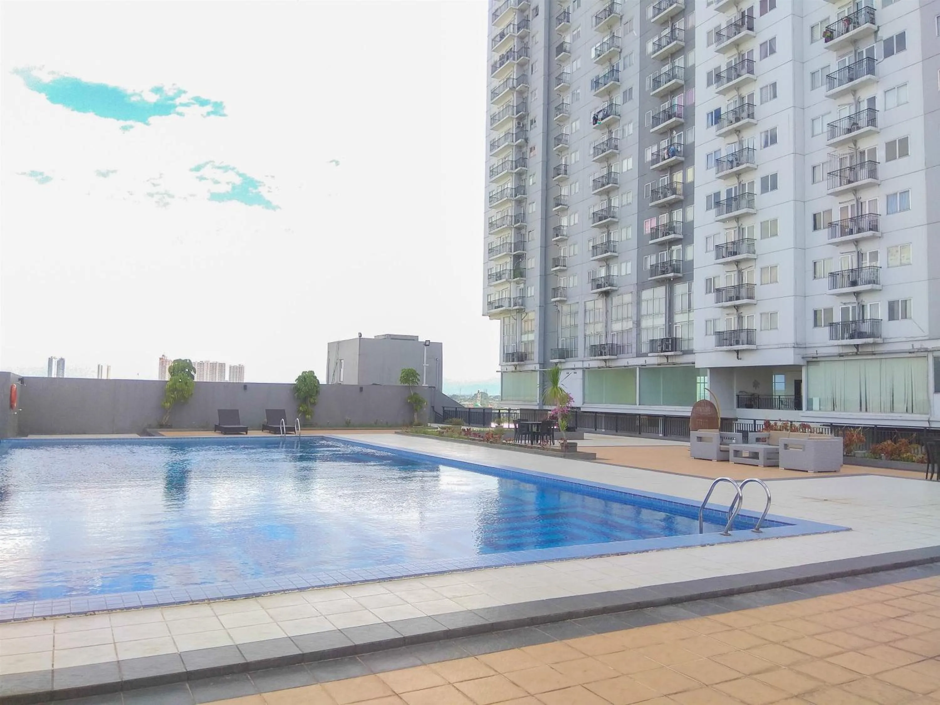 Minimalist Studio Park View Condominium Apartment near Mall By Travelio