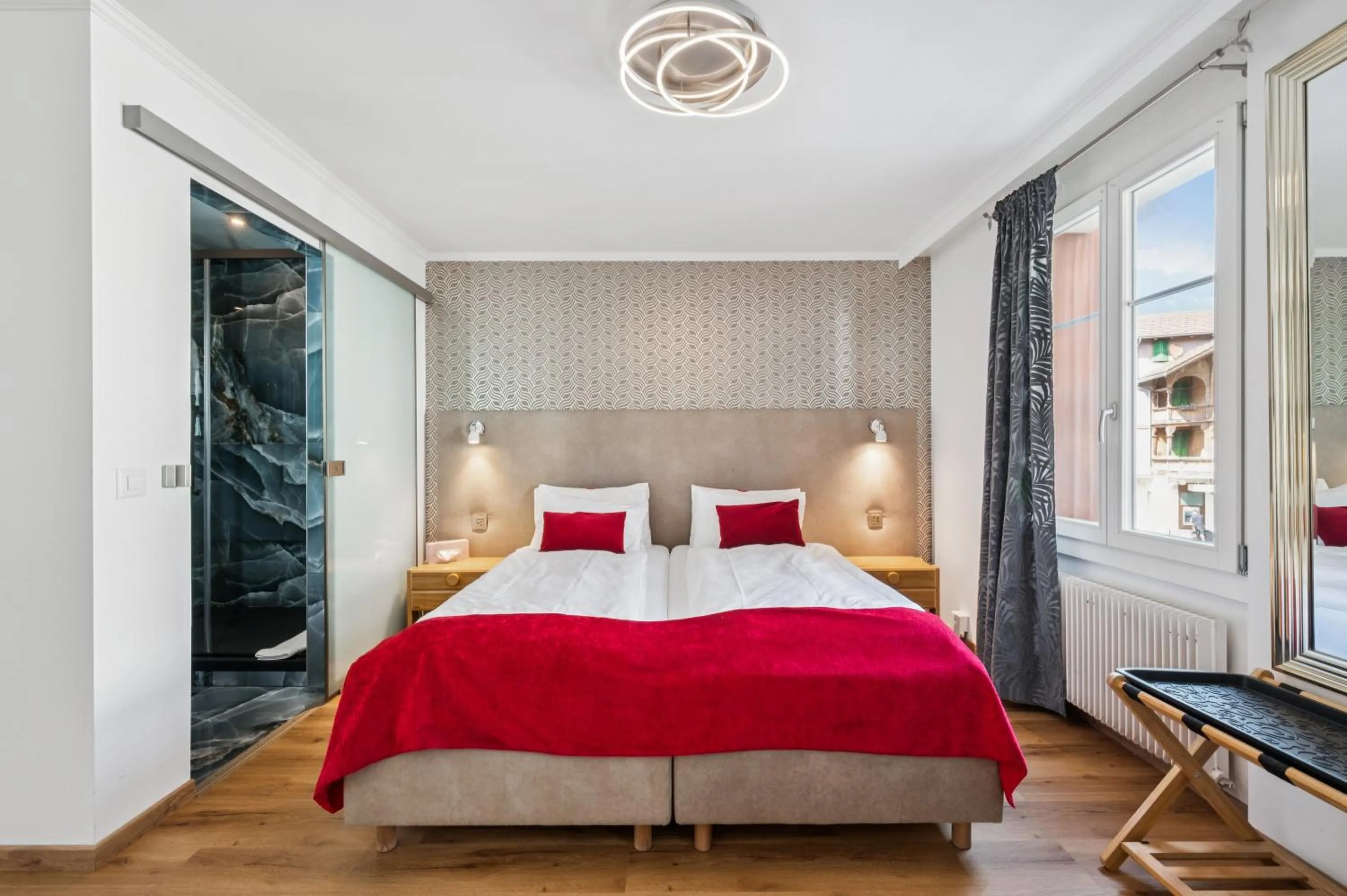 Bedroom, Bed in Hotel Sonne Interlaken-Matten