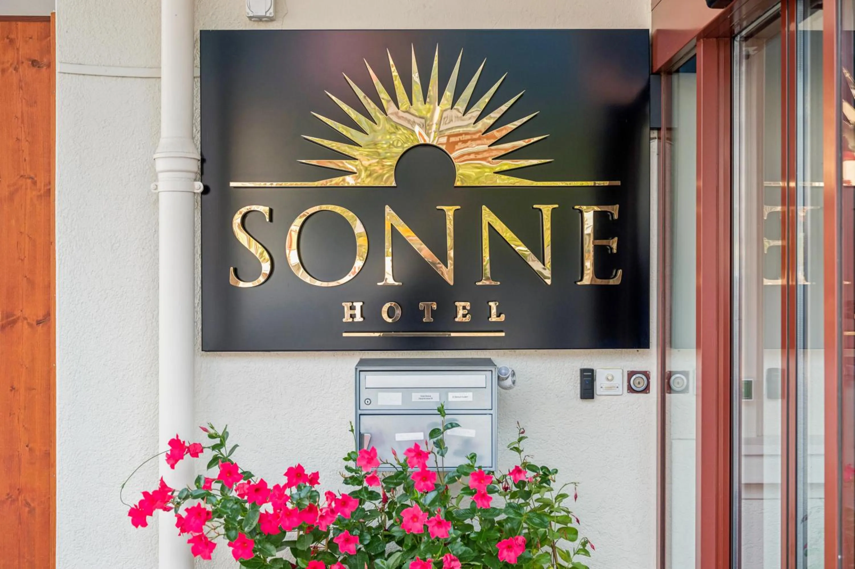 Property logo or sign in Hotel Sonne Interlaken-Matten