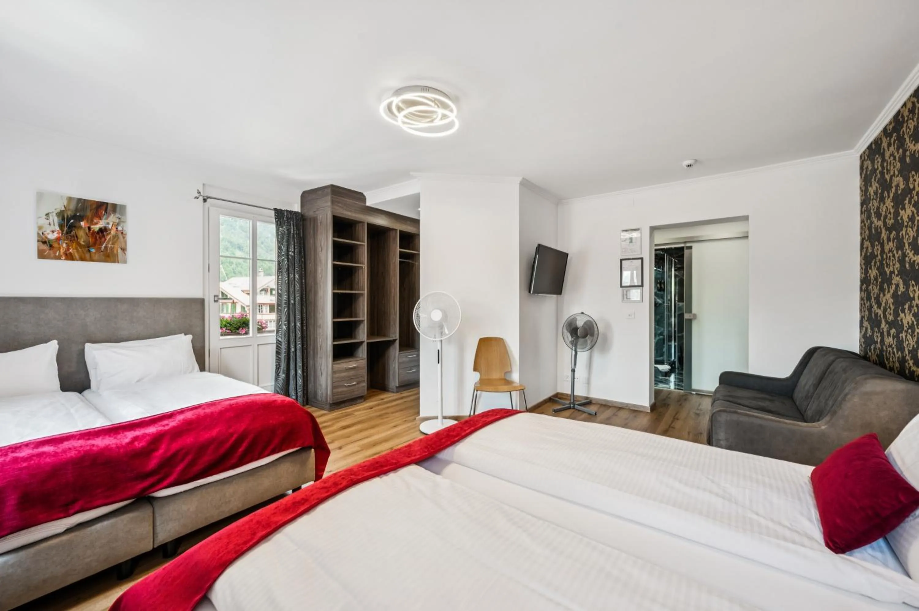 Bedroom, Bed in Hotel Sonne Interlaken-Matten