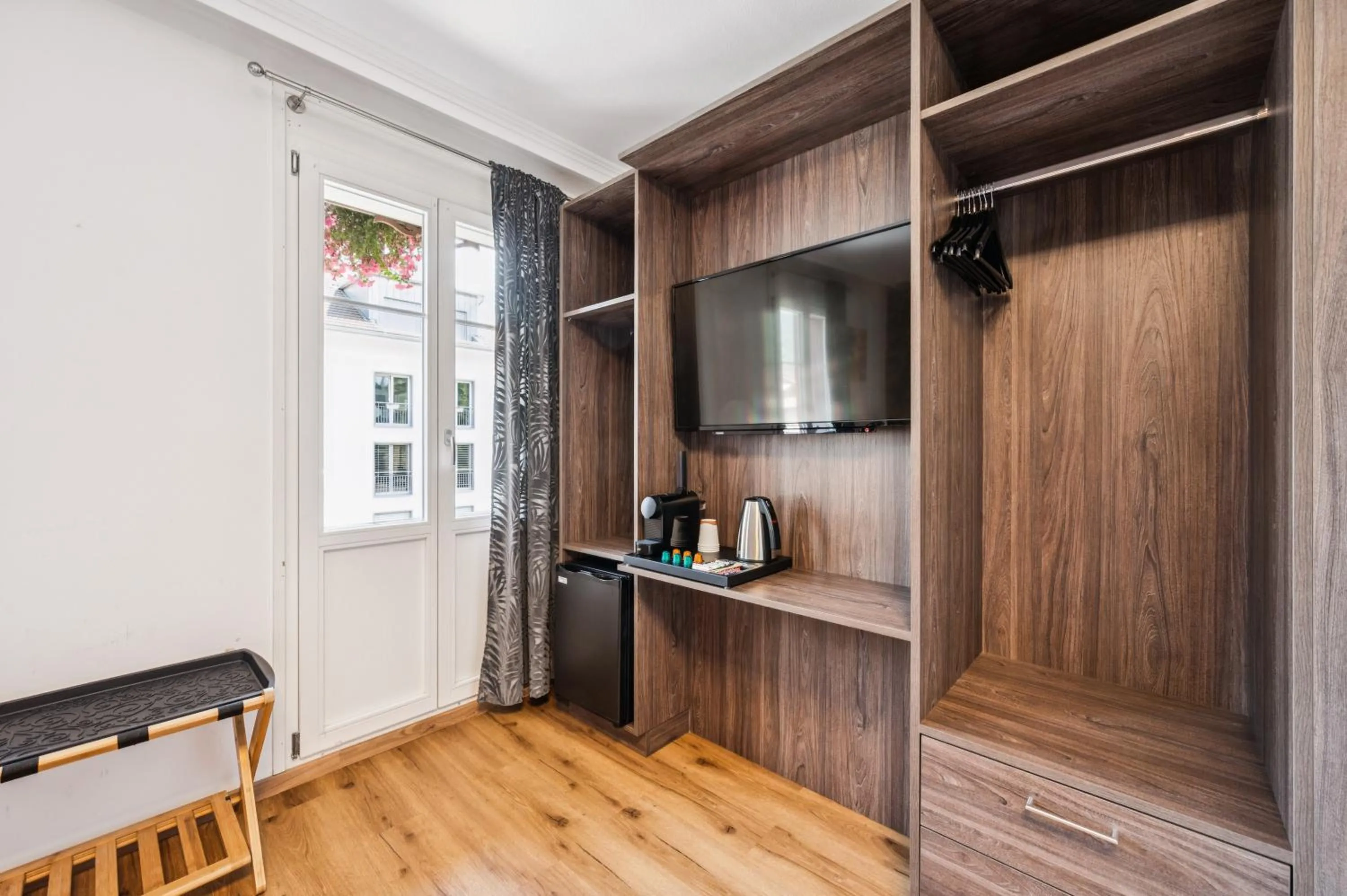 Bedroom in Hotel Sonne Interlaken-Matten
