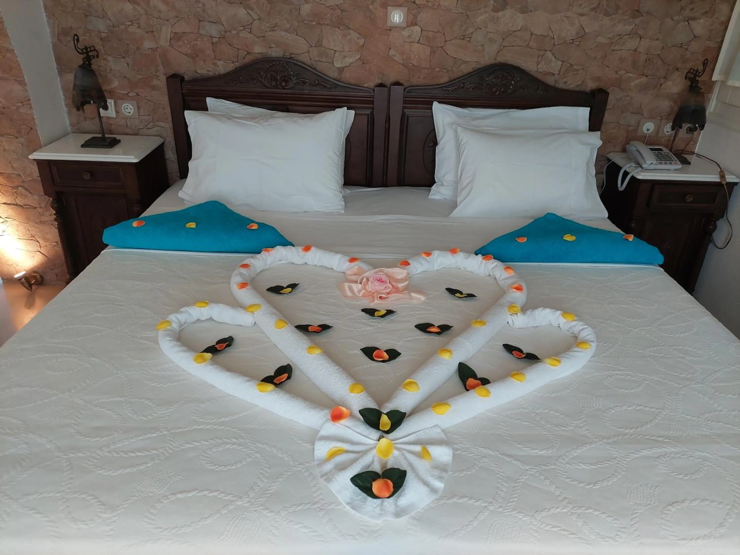 Bed in TINOS AQUA PALAZZO