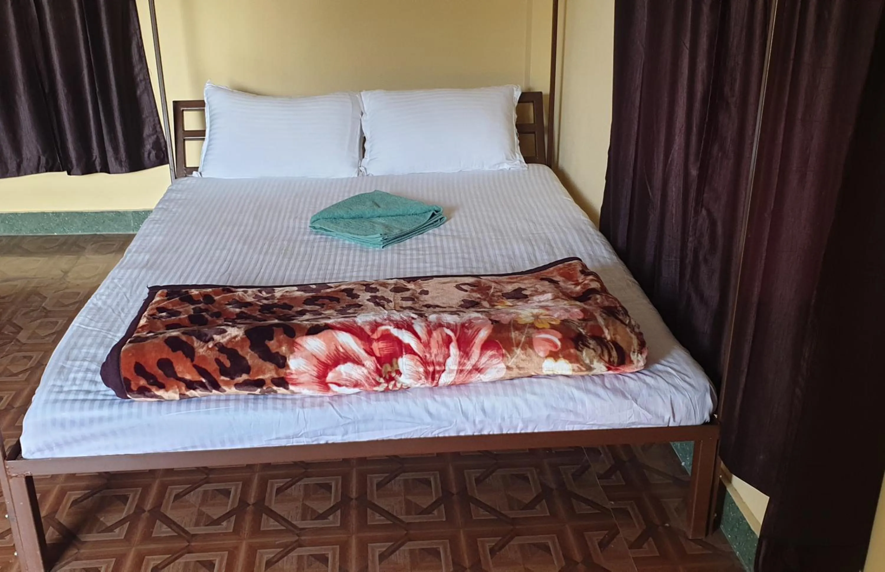 Bed in Elephant Garden Hotel and Resort Pvt Ltd