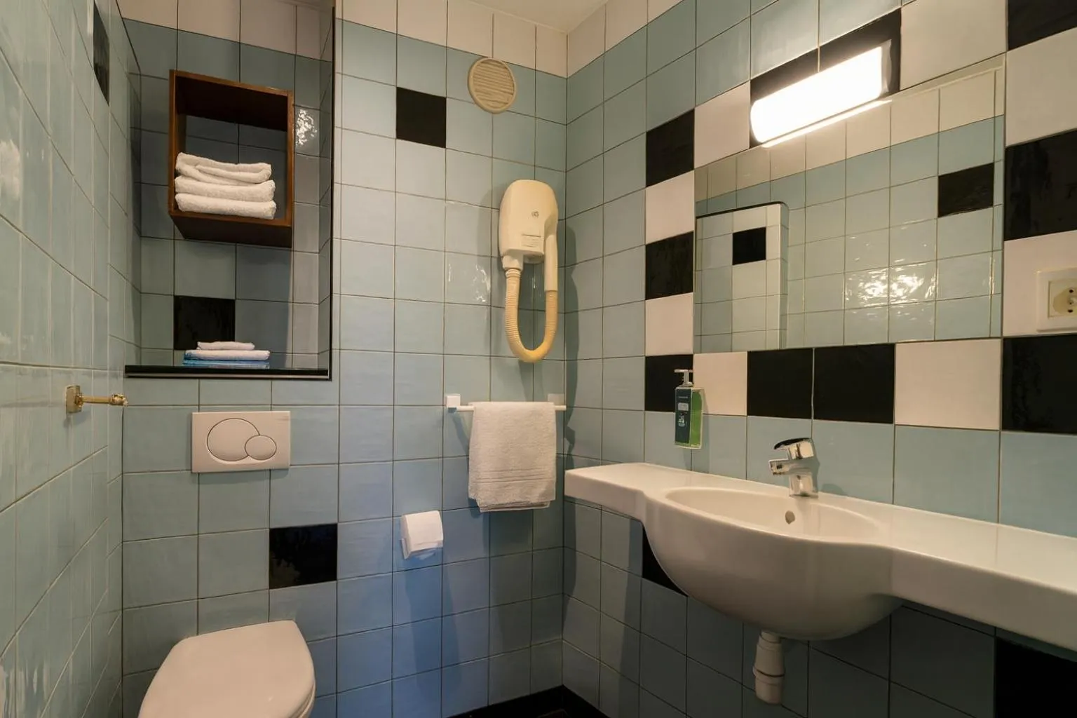 Shower in Walled off Hotel Paris