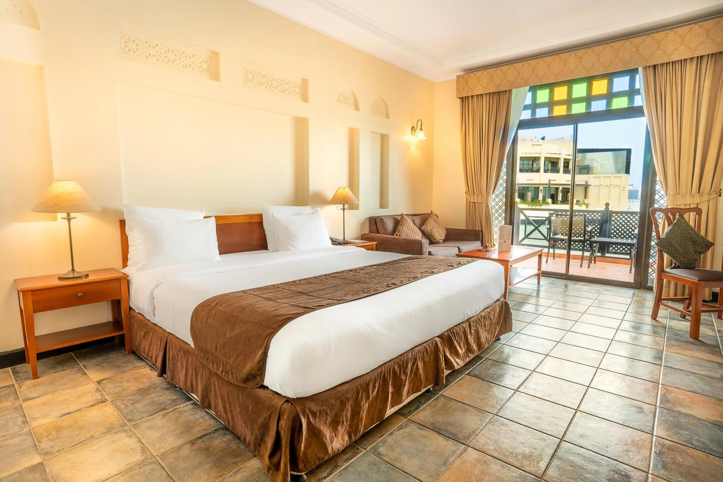 Balcony/Terrace, Bed in Novotel Bahrain Al Dana Resort