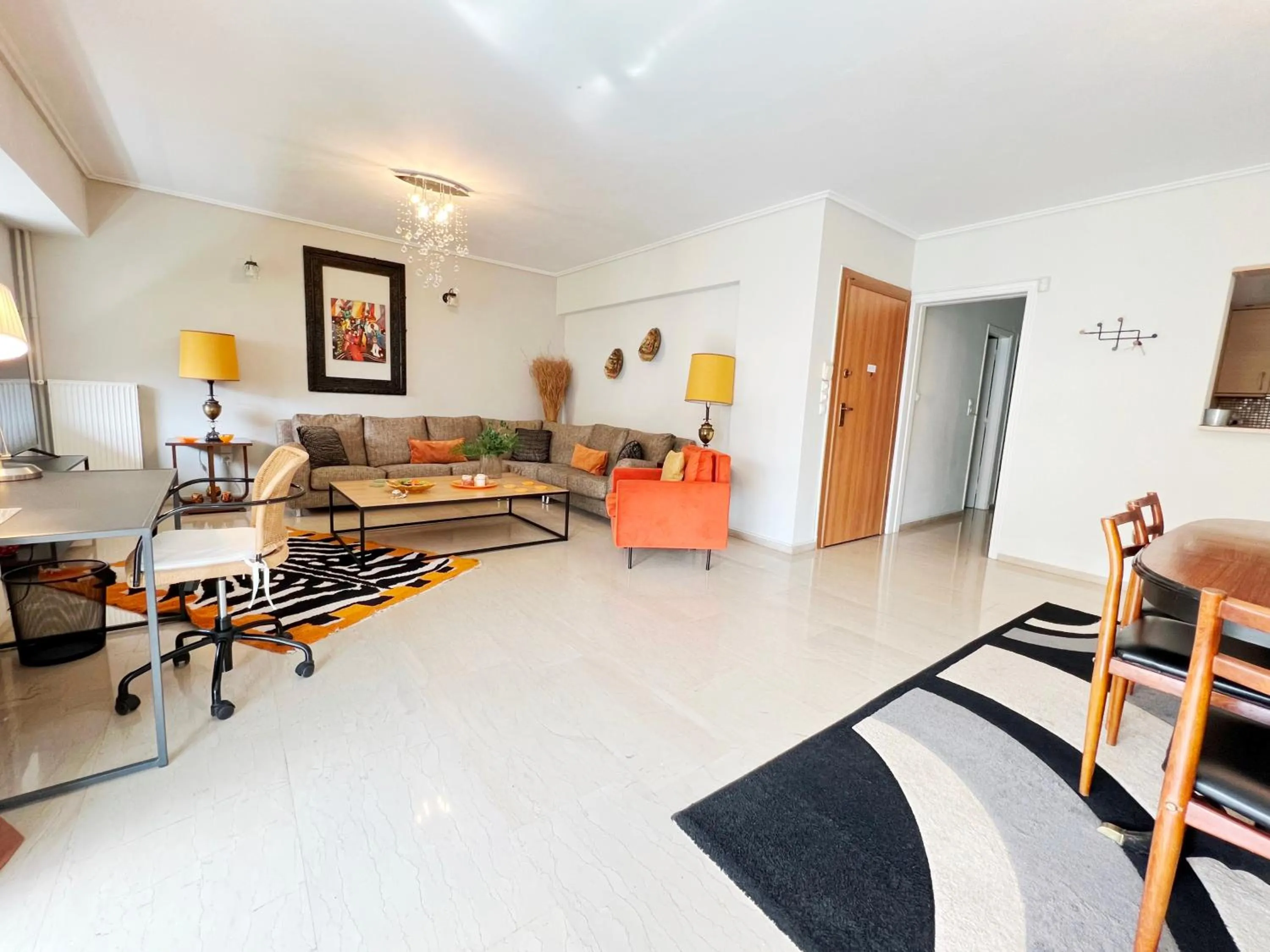 Living room in Peaceful Apartment by Flisvos Marina by Athenian Homes