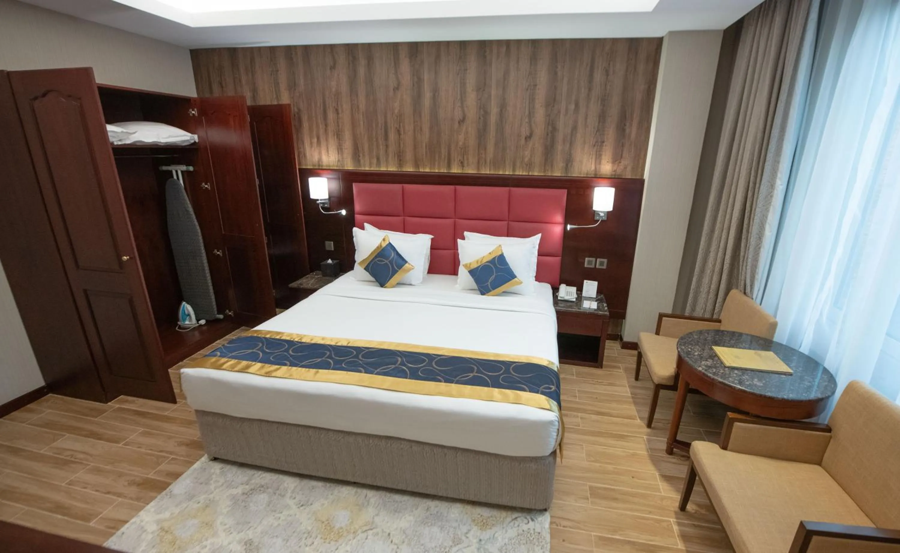 wardrobe, Bed in Ramee Guestline Hotel