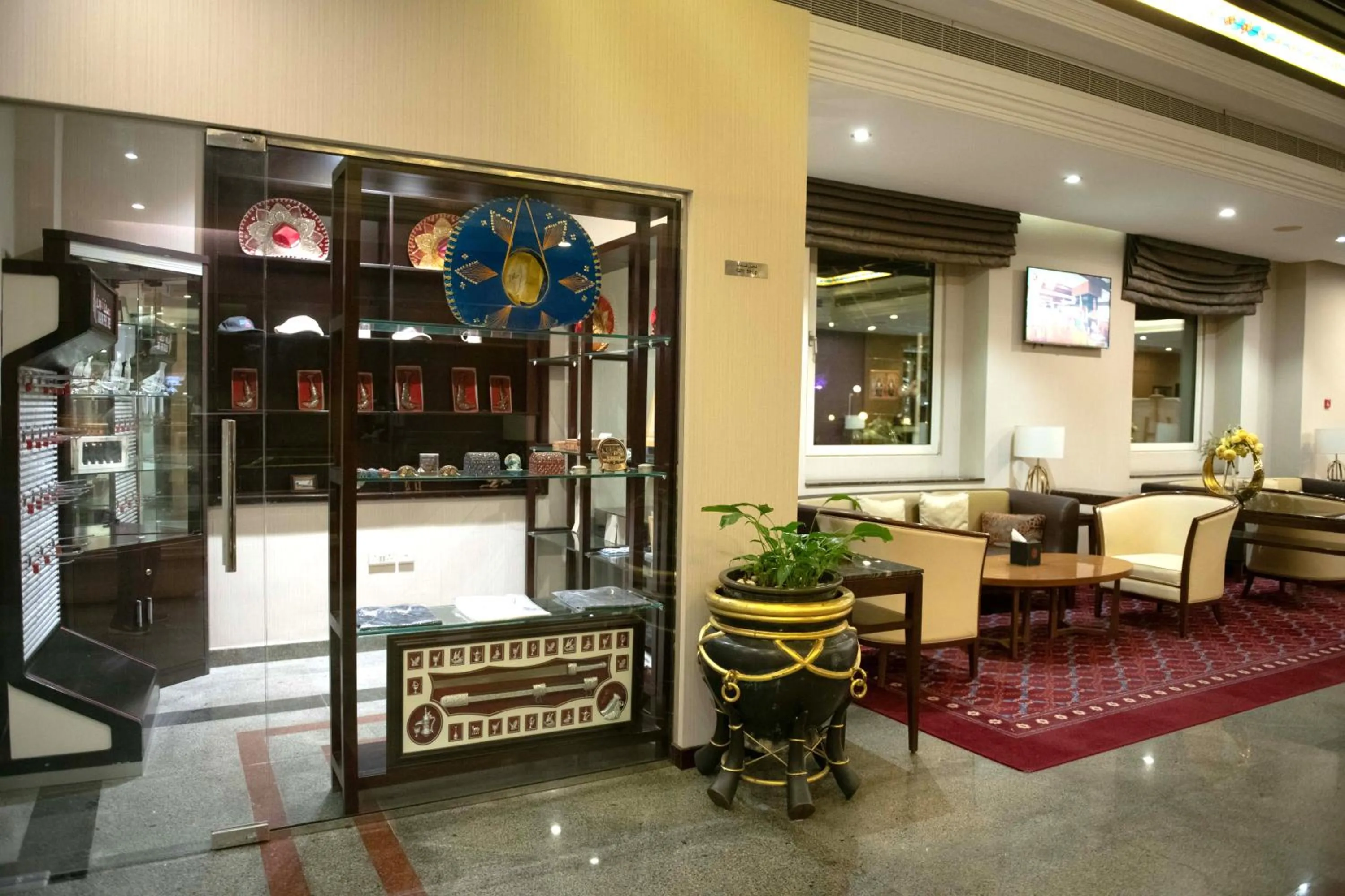 Seating area in Ramee Guestline Hotel