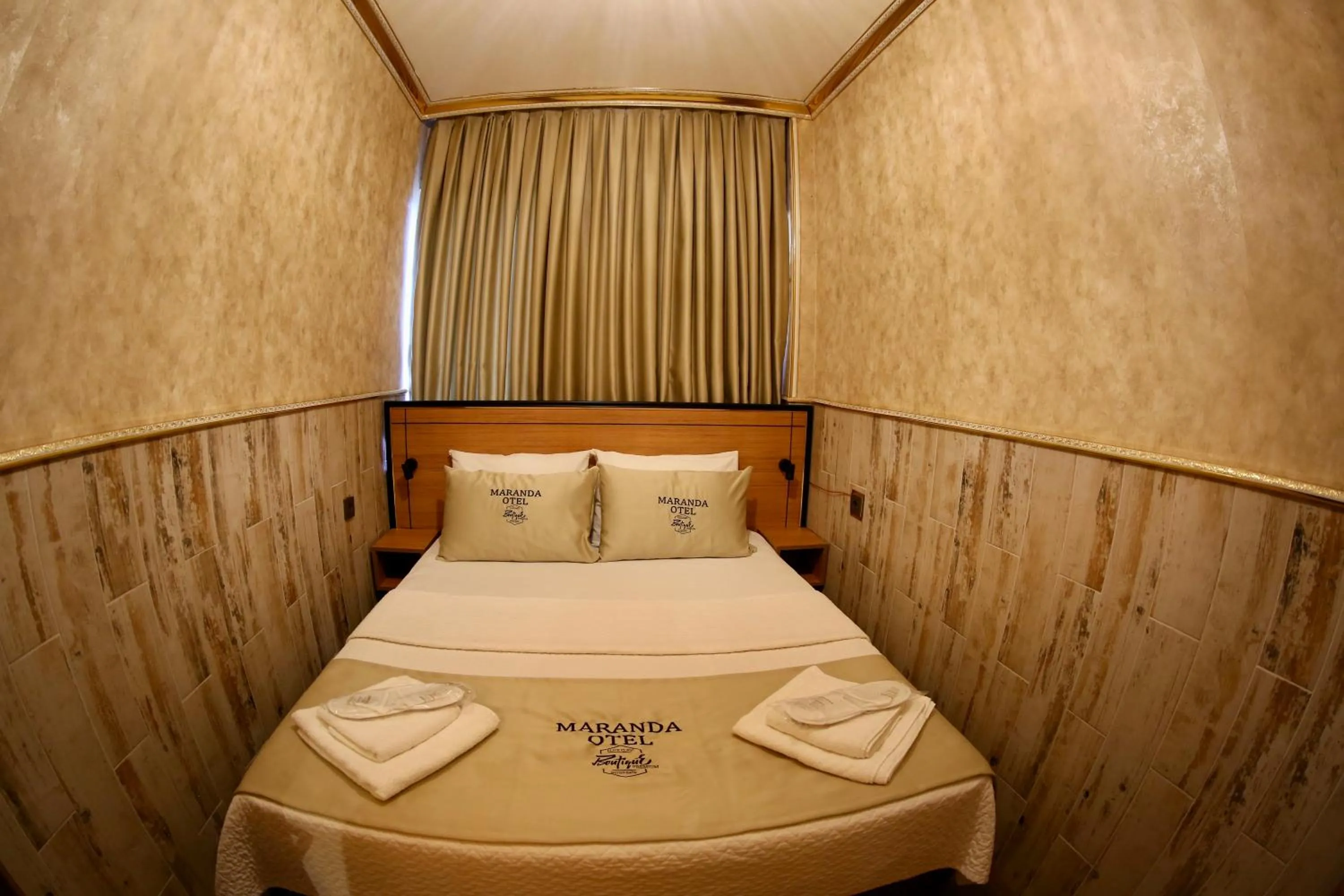 Bed in Maranda Suit Hotel