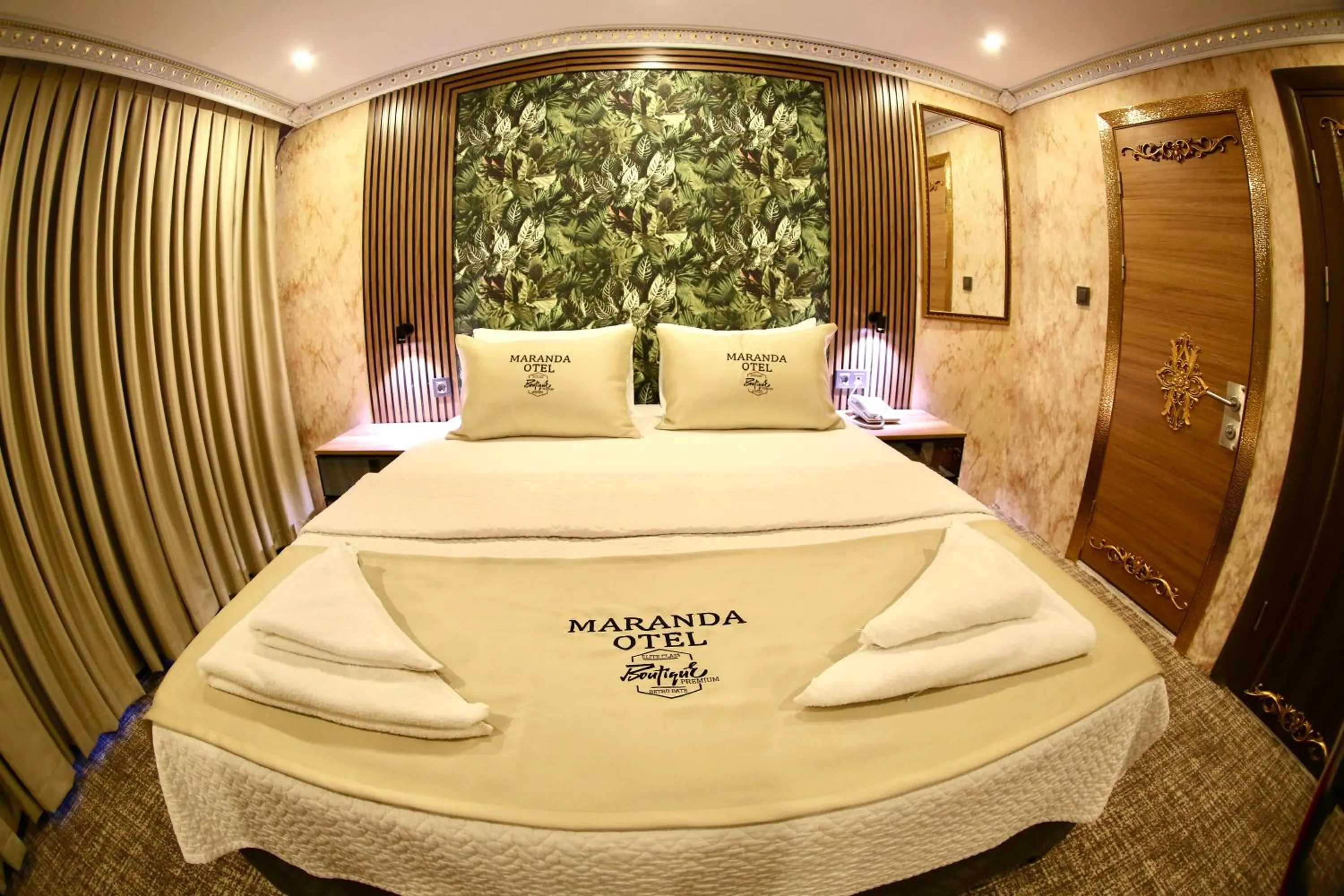 Bed in Maranda Suit Hotel