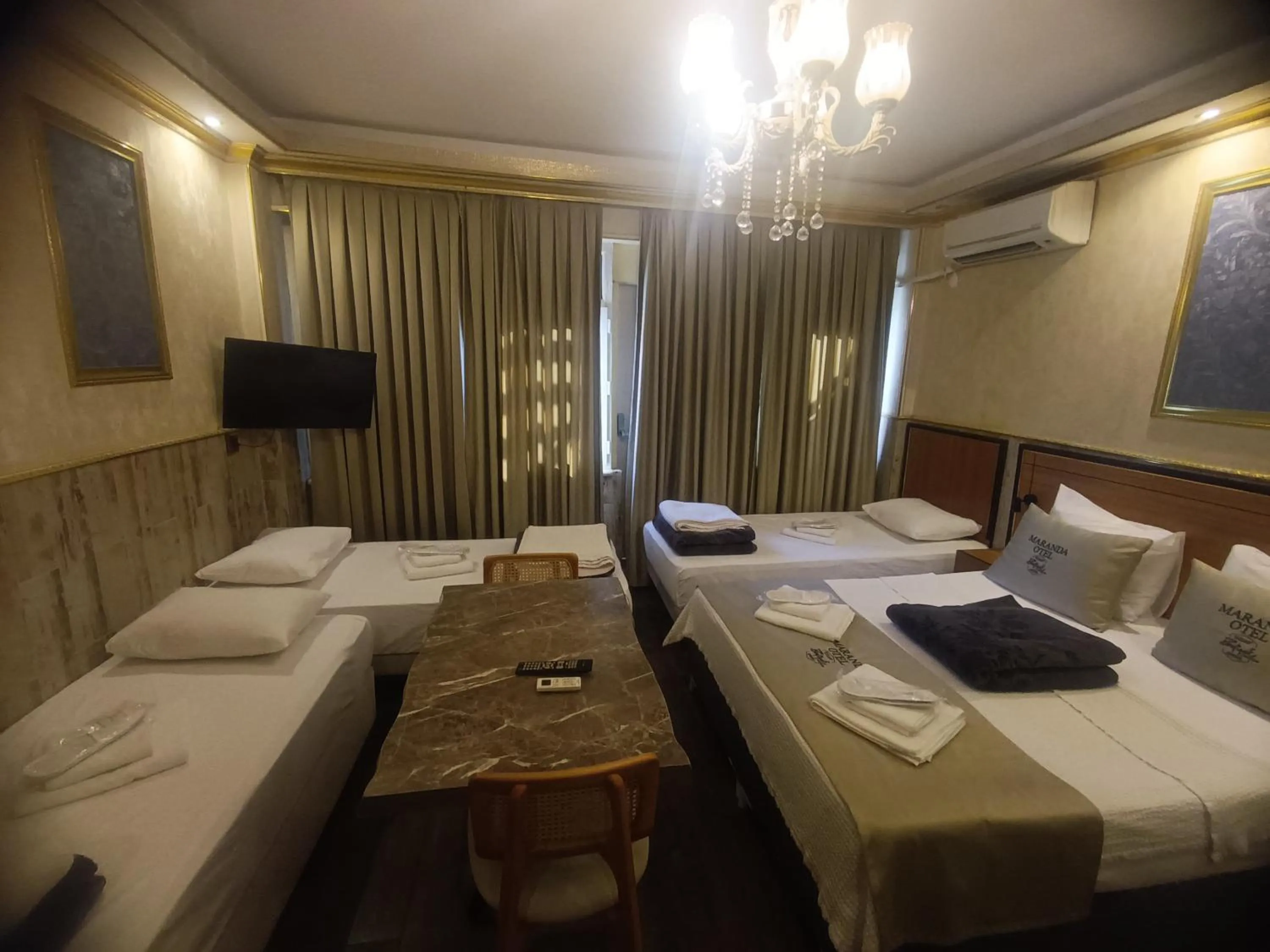 Living room, Bed in Maranda Suit Hotel