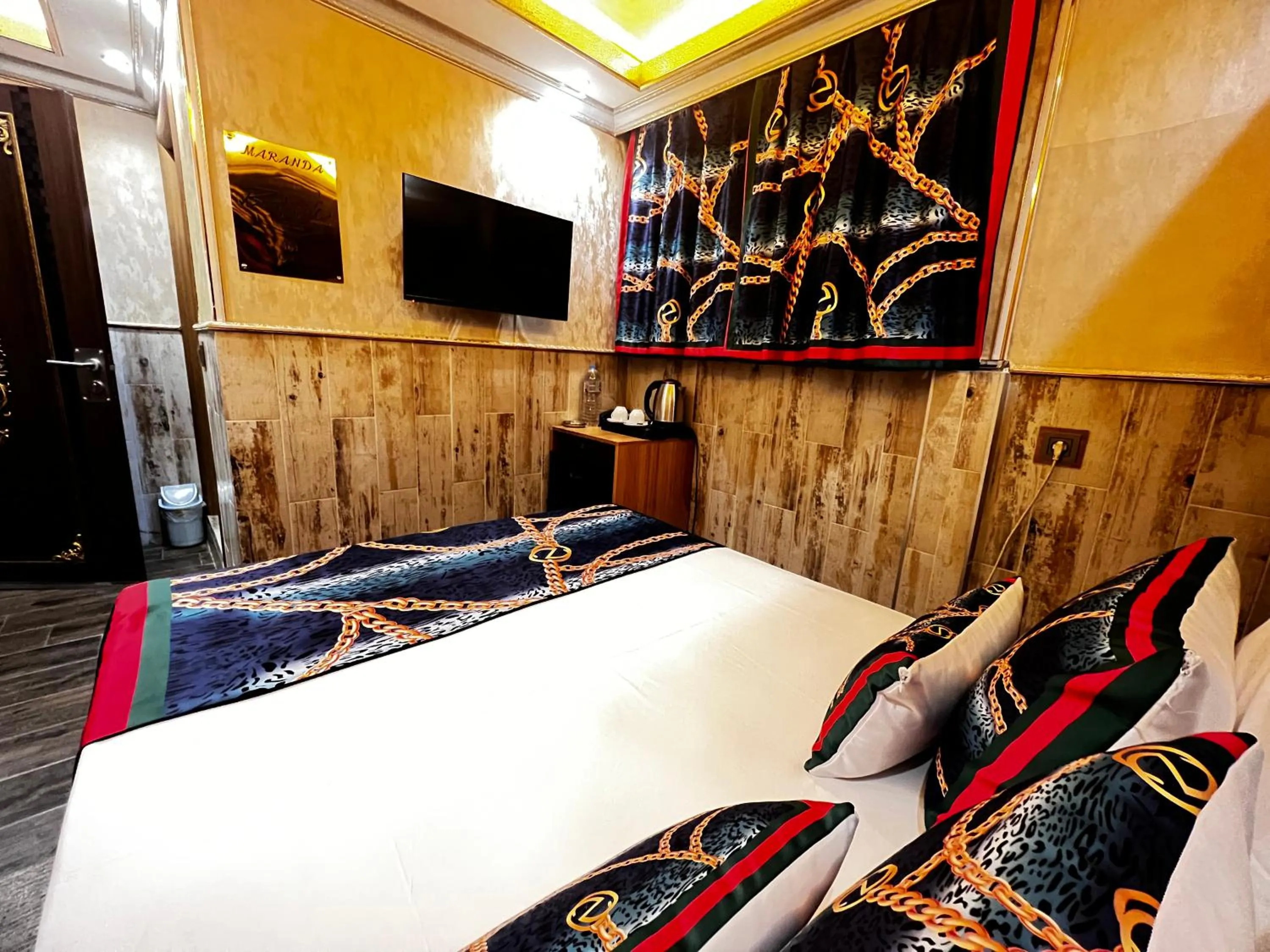 Bed in Maranda Suit Hotel