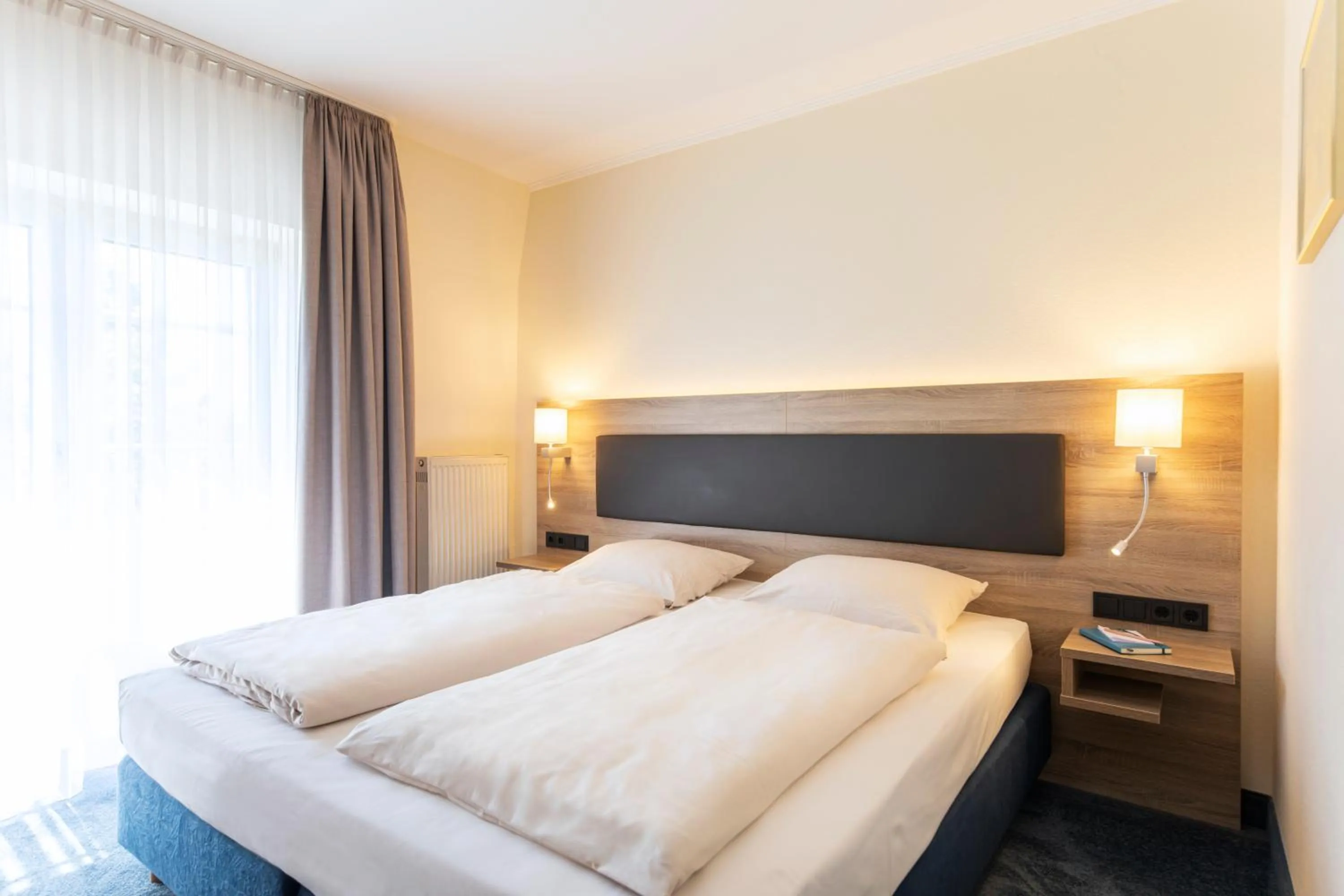 Bedroom, Bed in Roomingtons Hotel Lohr am Main