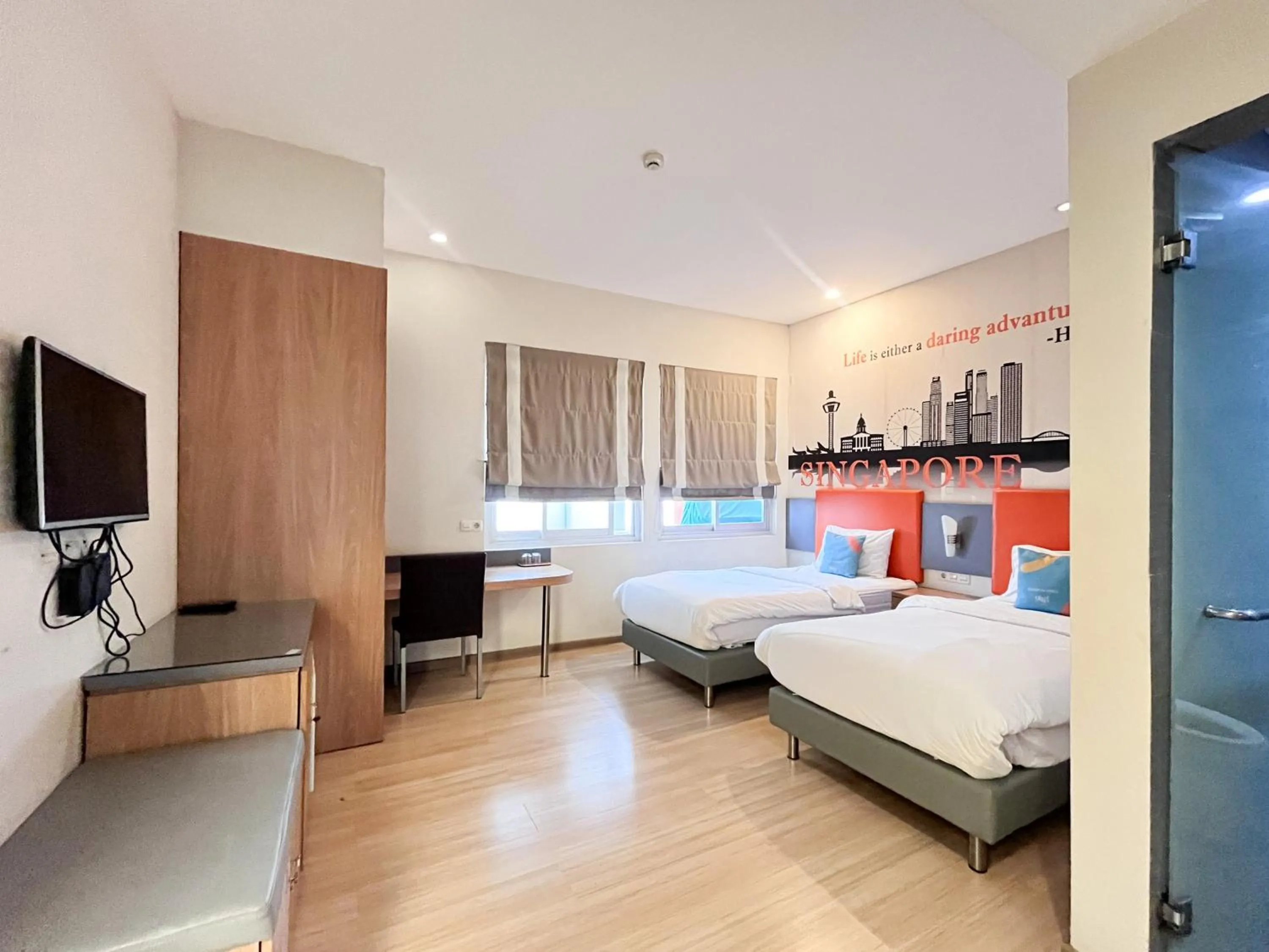 Bedroom, Bed in Sans Vibes Hotel Syariah Graha 100 Gubeng Surabaya