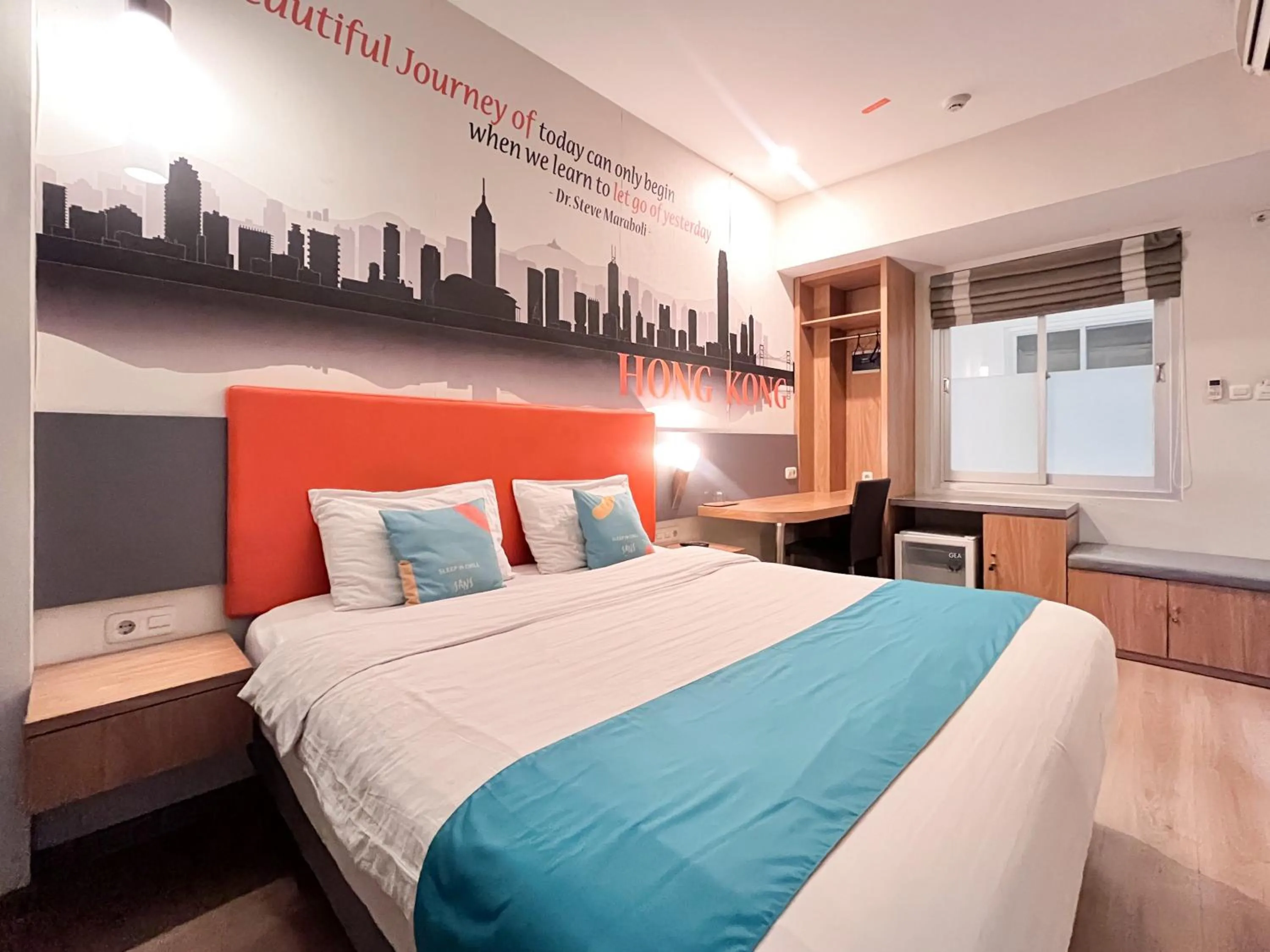 Bedroom, Bed in Sans Vibes Hotel Syariah Graha 100 Gubeng Surabaya