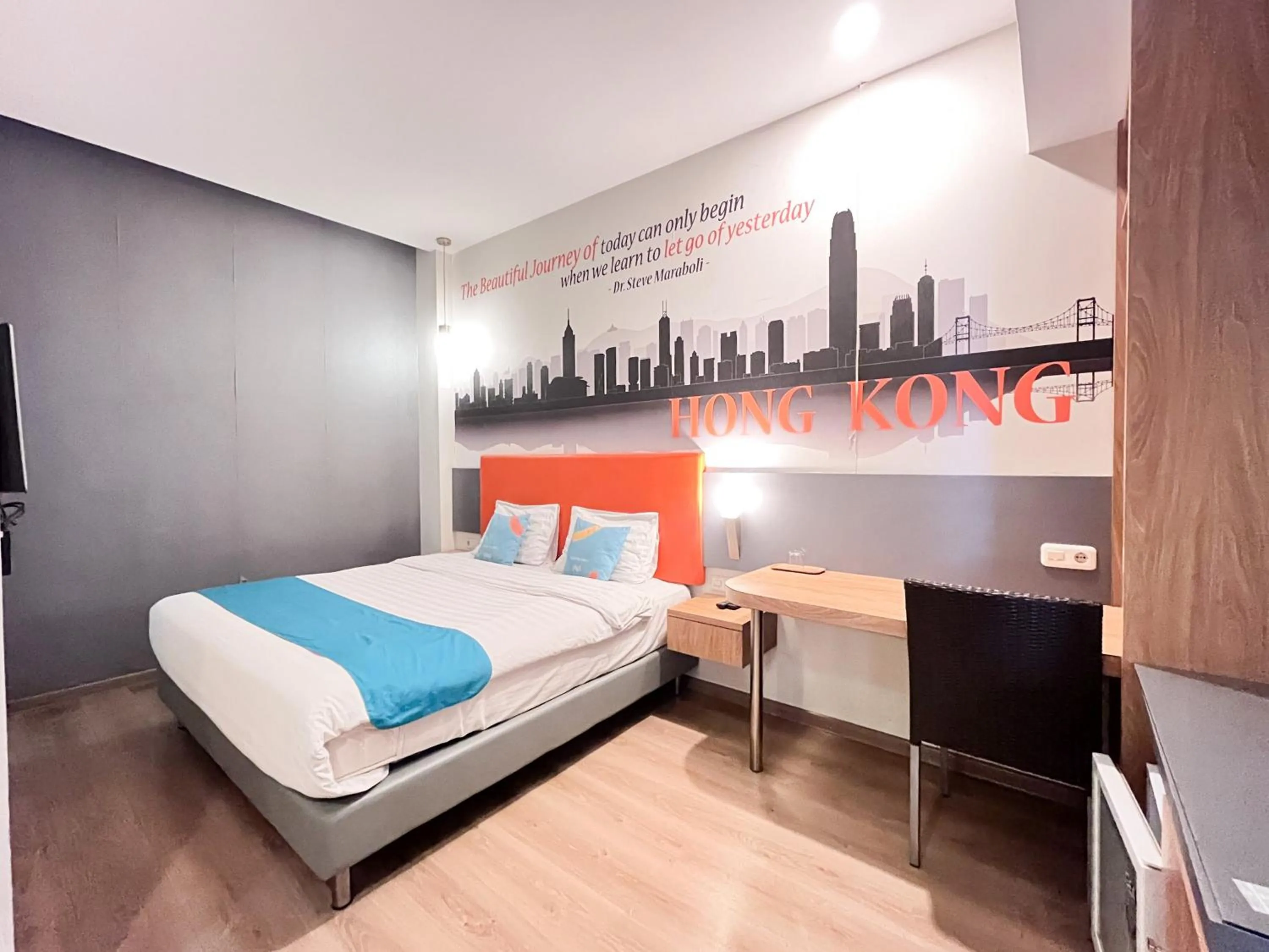 Bedroom, Bed in Sans Vibes Hotel Syariah Graha 100 Gubeng Surabaya