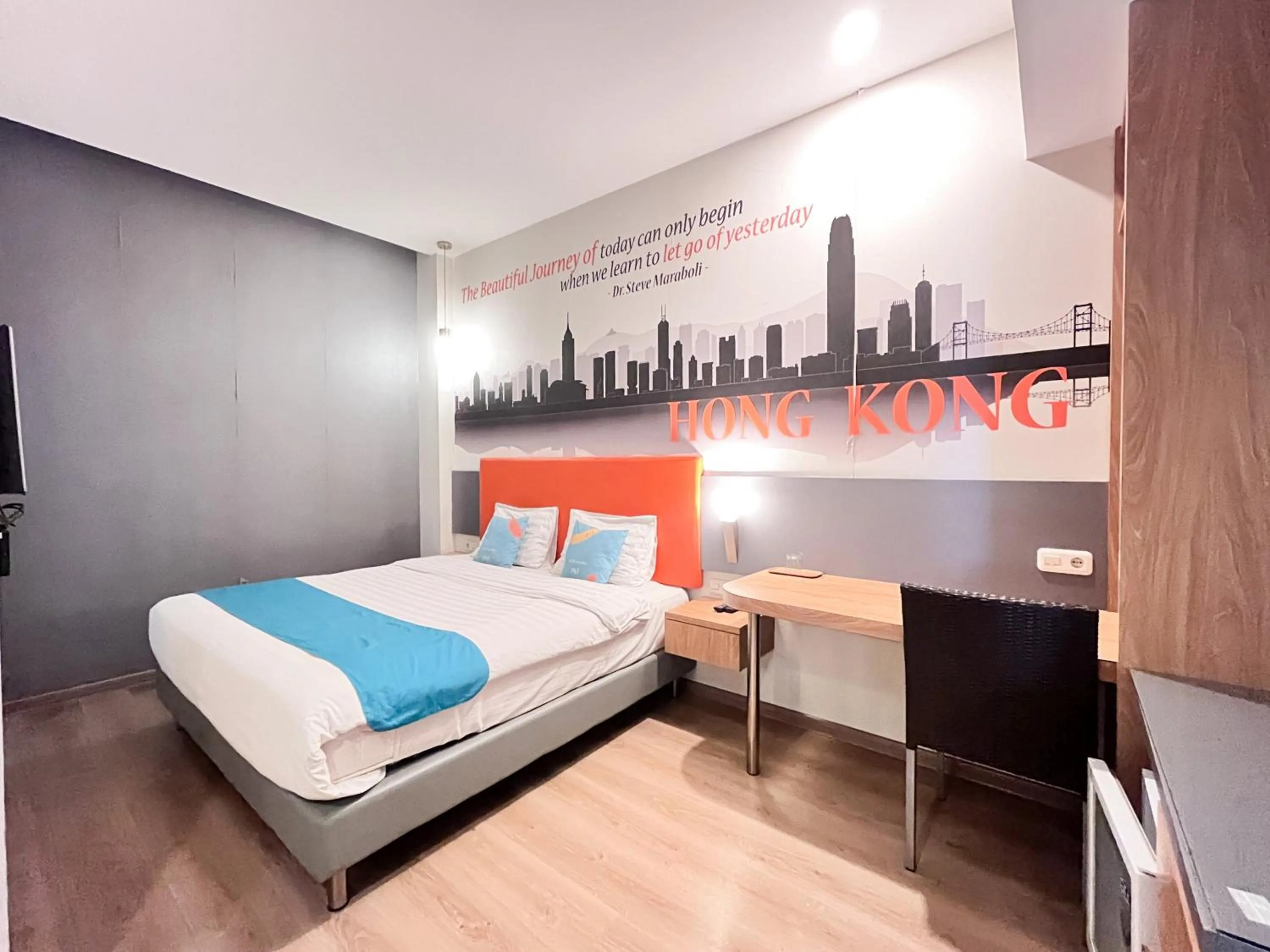 Bedroom, Bed in Sans Vibes Hotel Syariah Graha 100 Gubeng Surabaya