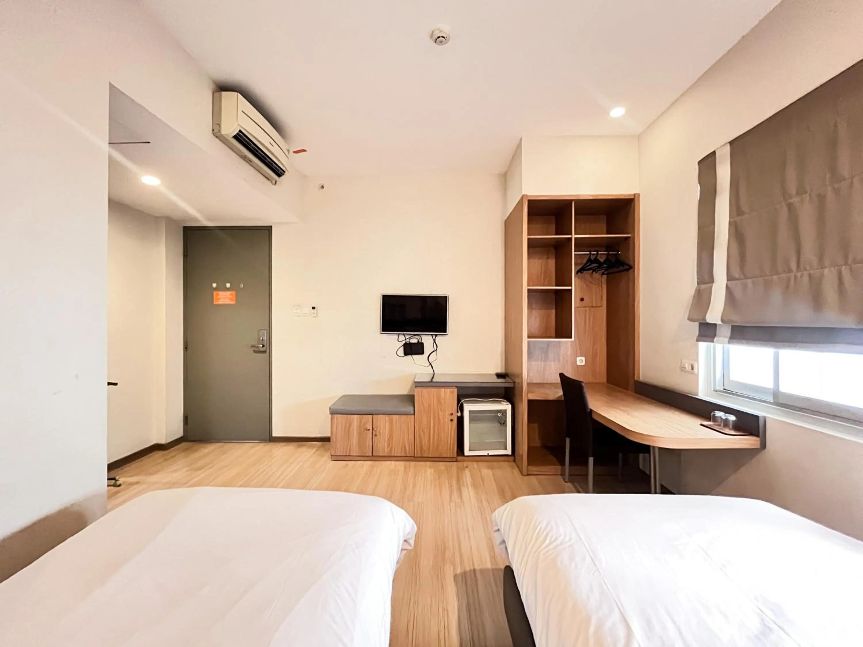 Bedroom, Bed in Sans Vibes Hotel Syariah Graha 100 Gubeng Surabaya