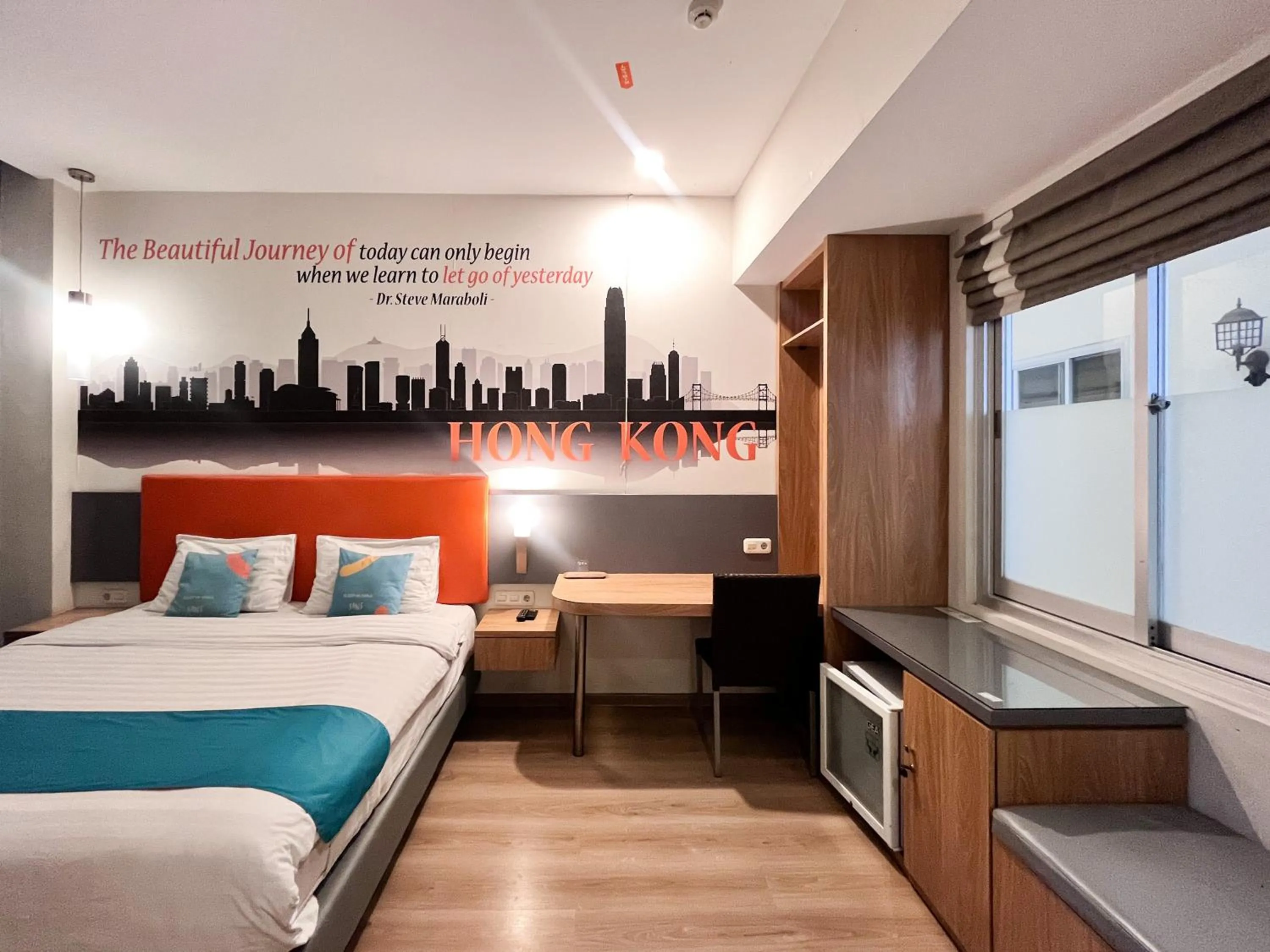 Bedroom, Bed in Sans Vibes Hotel Syariah Graha 100 Gubeng Surabaya