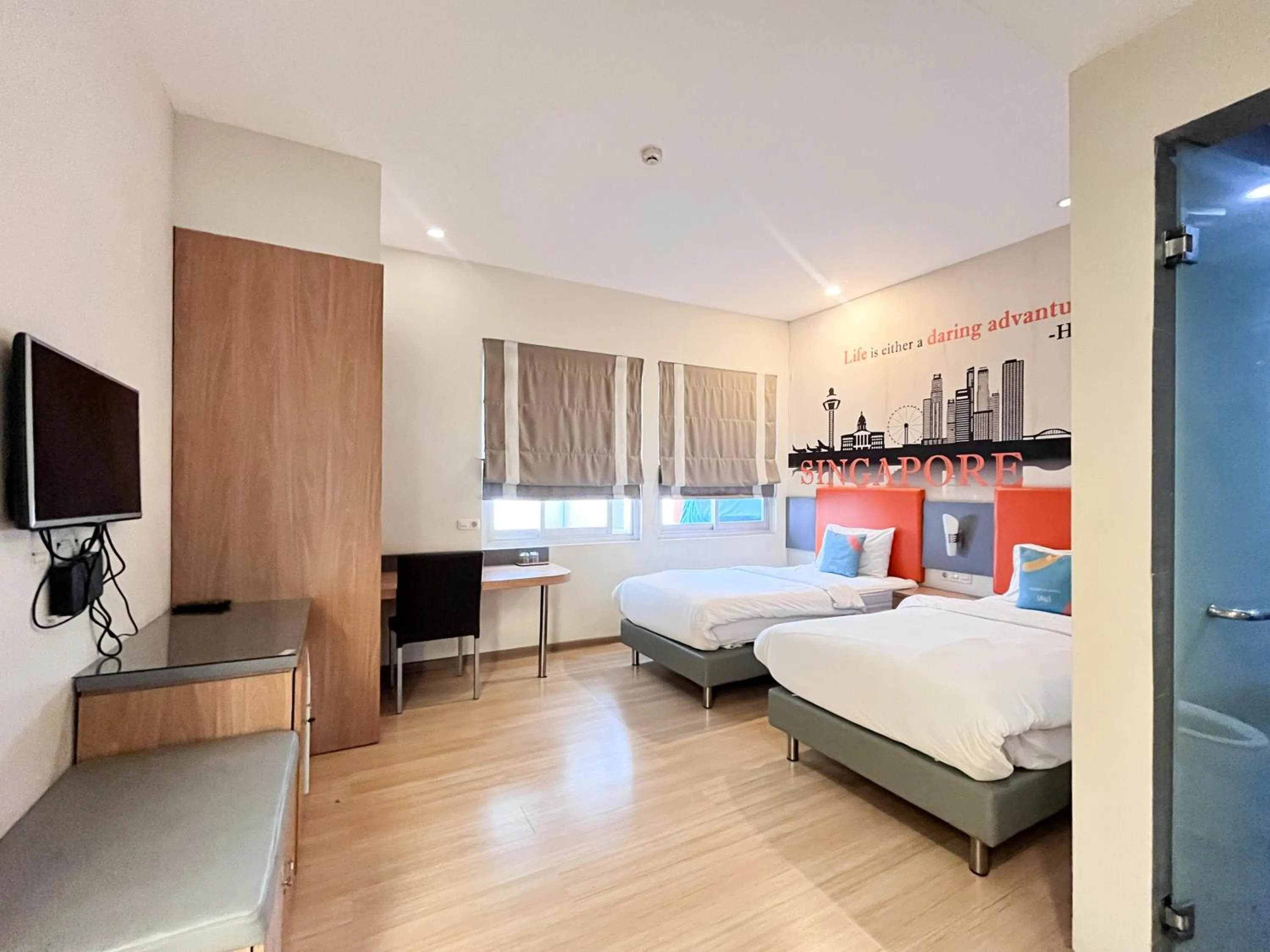 Bedroom, Bed in Sans Vibes Hotel Syariah Graha 100 Gubeng Surabaya