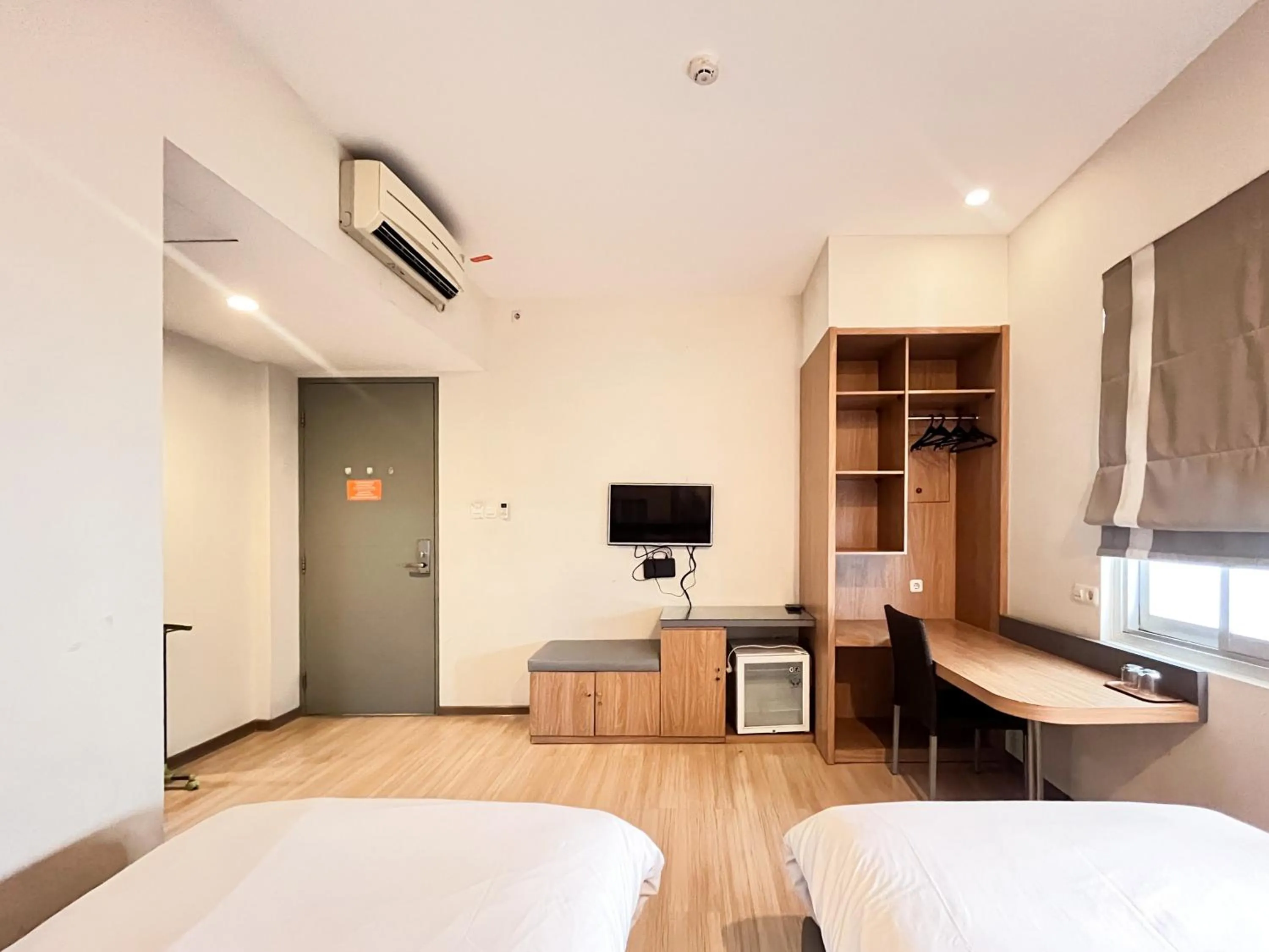 Bedroom, Bed in Sans Vibes Hotel Syariah Graha 100 Gubeng Surabaya