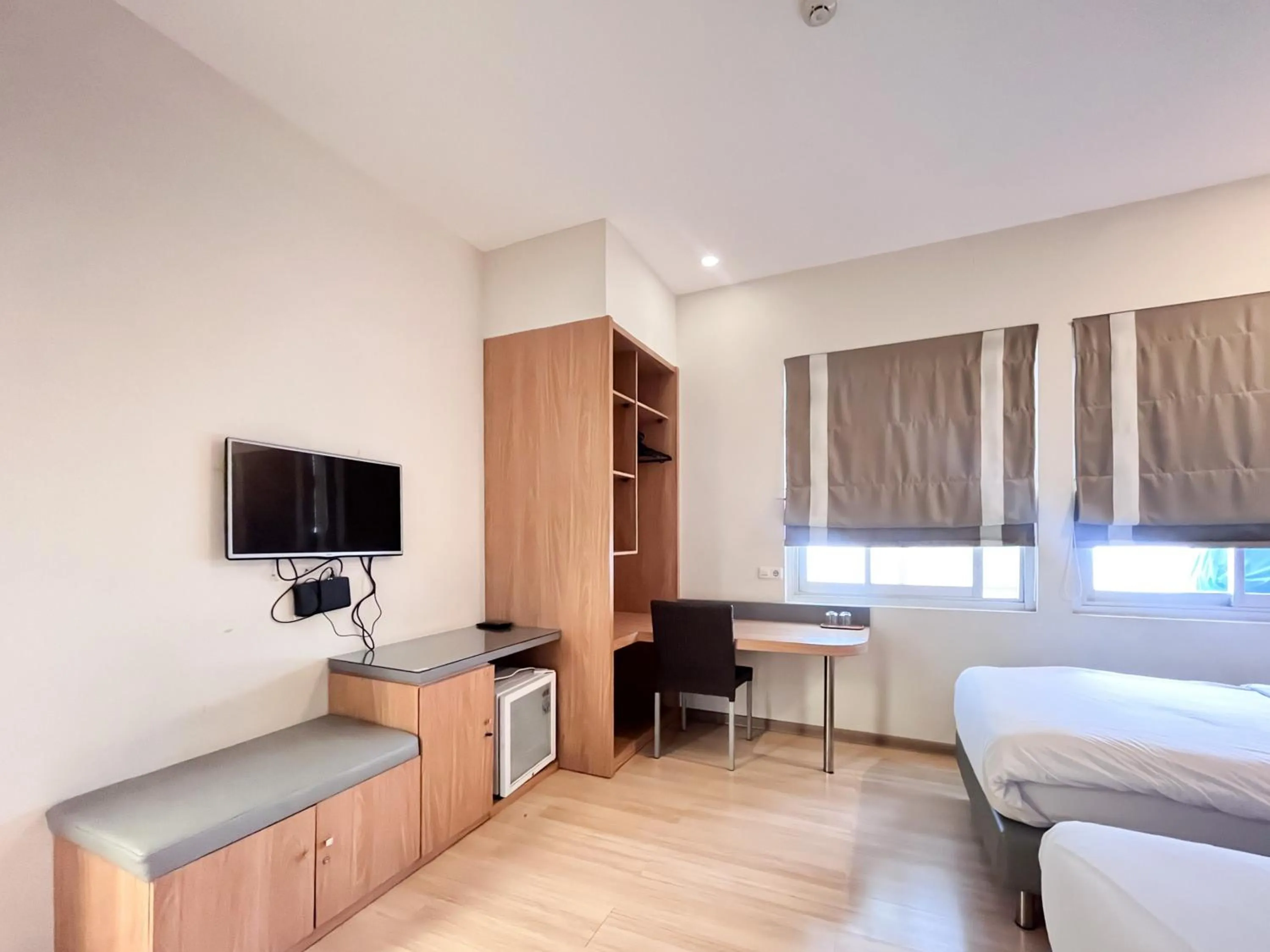 Bedroom, Bed in Sans Vibes Hotel Syariah Graha 100 Gubeng Surabaya