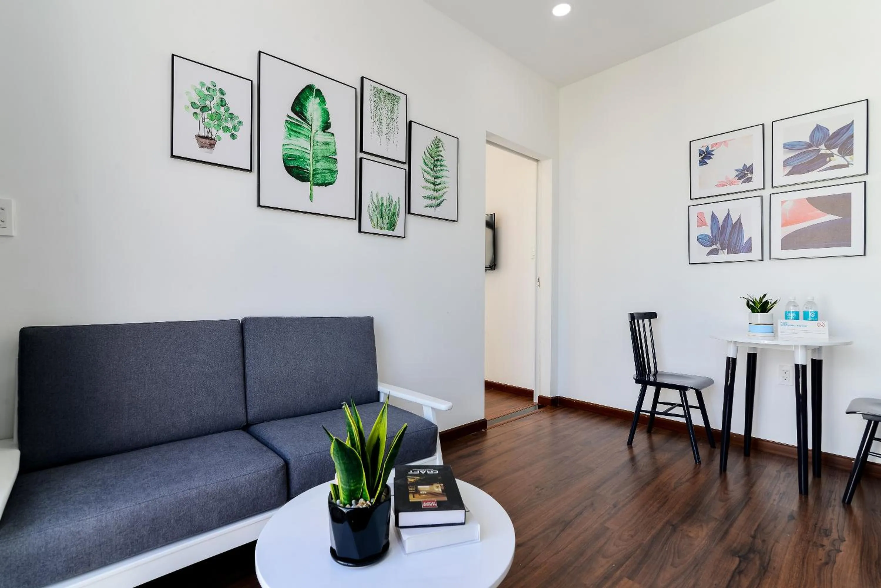 Living room in Cozrum Homes The Gallery Residence