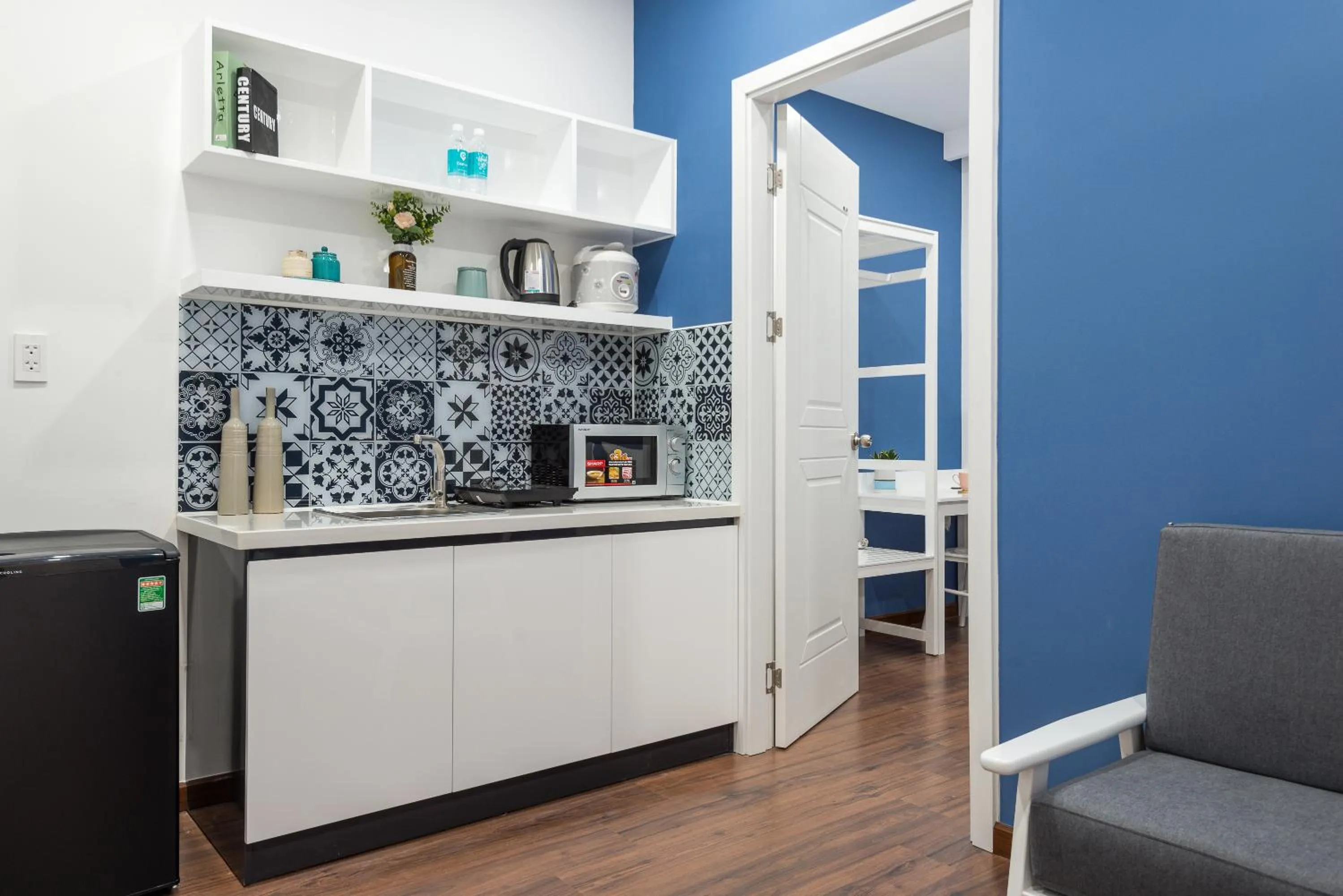 Living room in Cozrum Homes The Gallery Residence