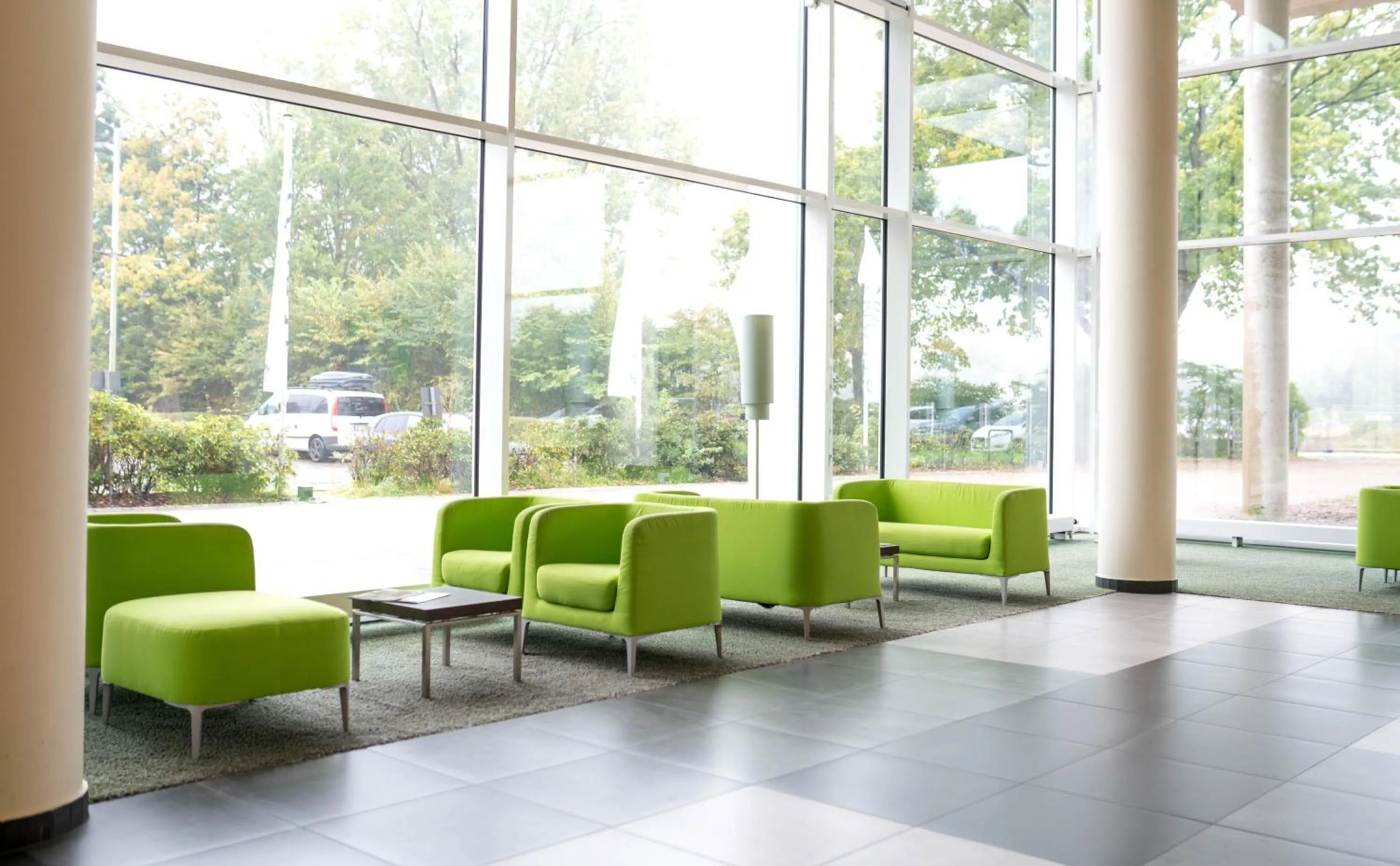 Communal lounge/ TV room in ATLANTIC Hotel Galopprennbahn