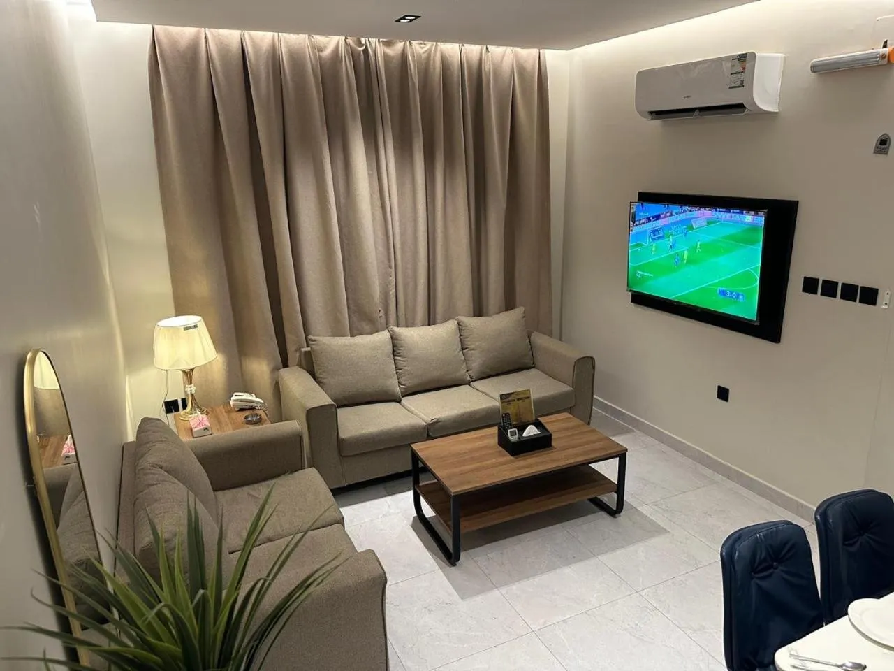 Communal lounge/ TV room in Golden Galaxies Furnished Units