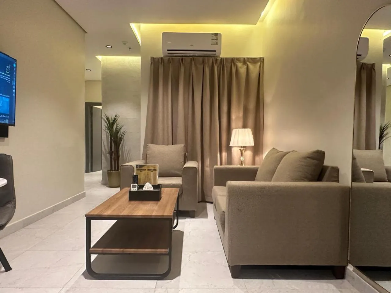 Communal lounge/ TV room in Golden Galaxies Furnished Units