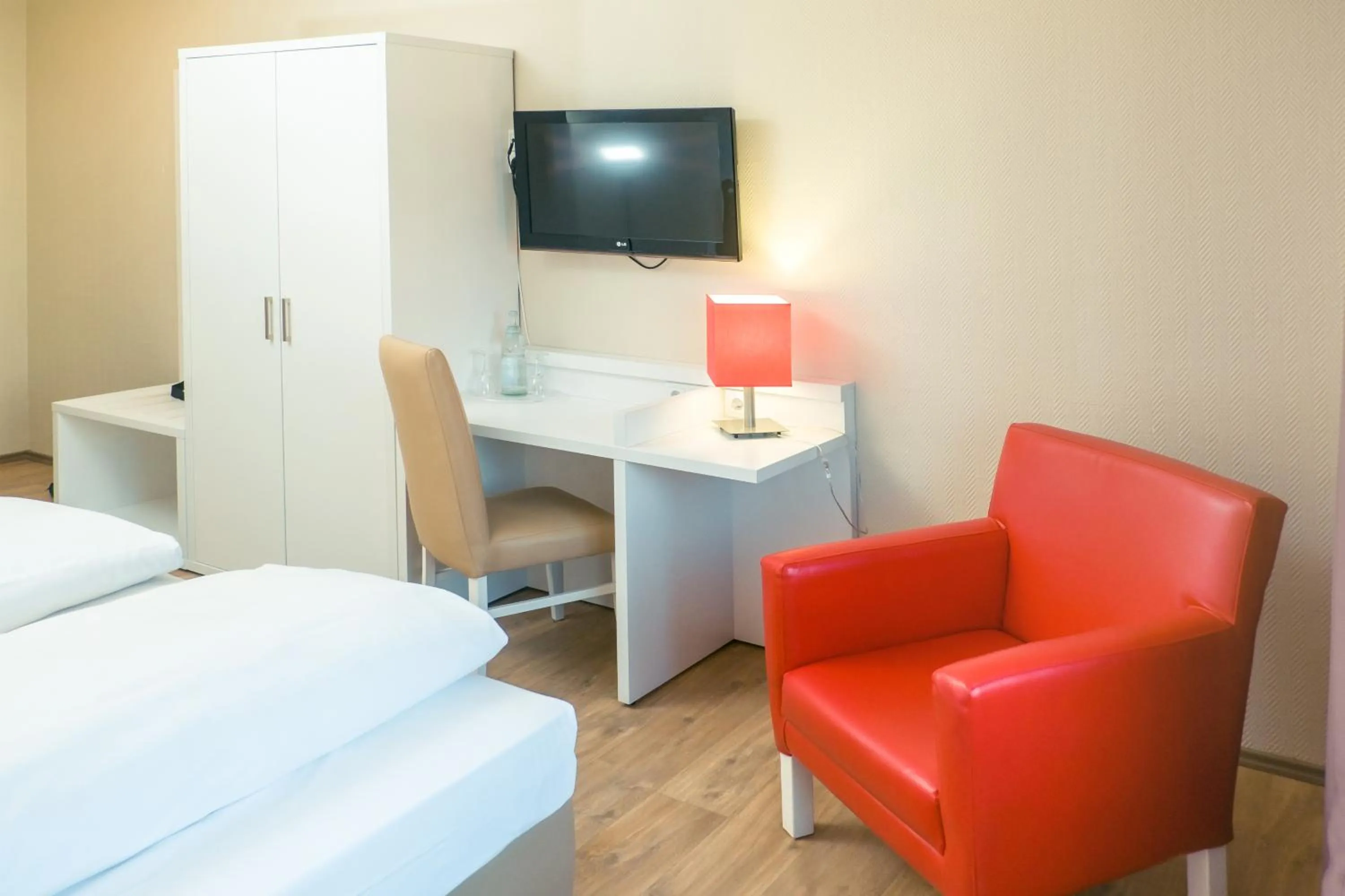 Photo of the whole room, Bed in Hotel Stuttgart Sindelfingen City by Tulip Inn