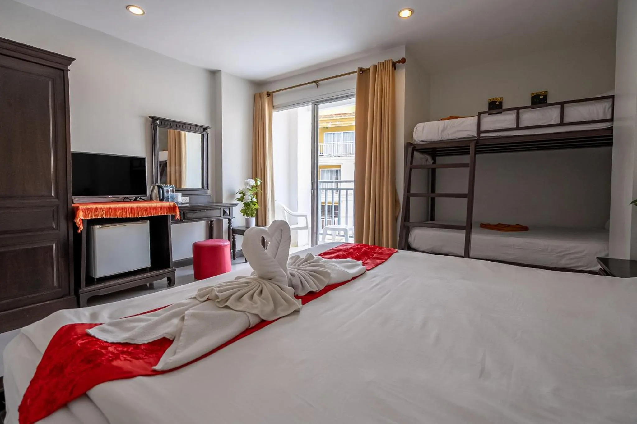 Communal lounge/ TV room, Bed in Garden Phuket Hotel