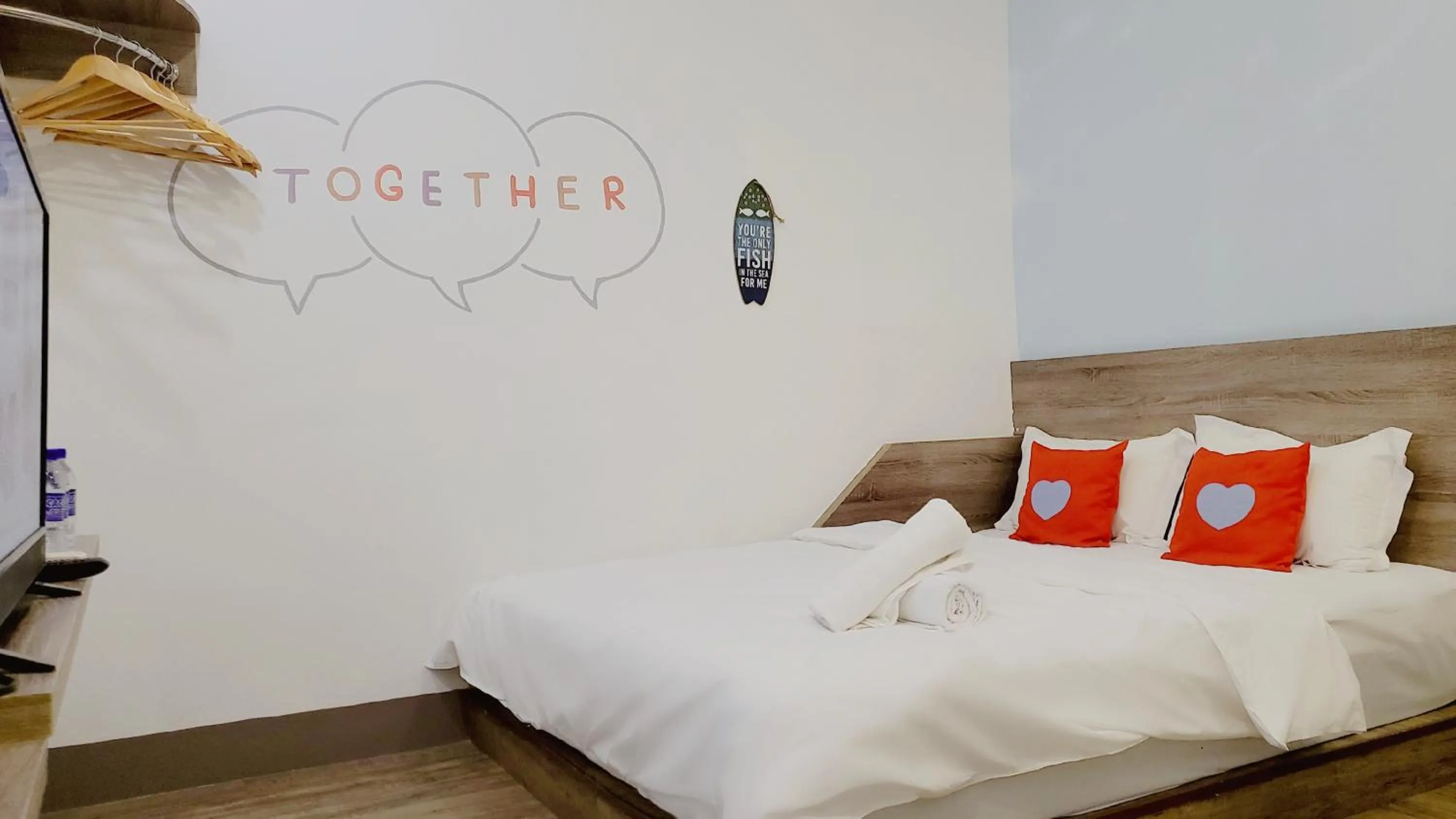 Bed in Winggarden Murals House by JE Boutique Guesthouse