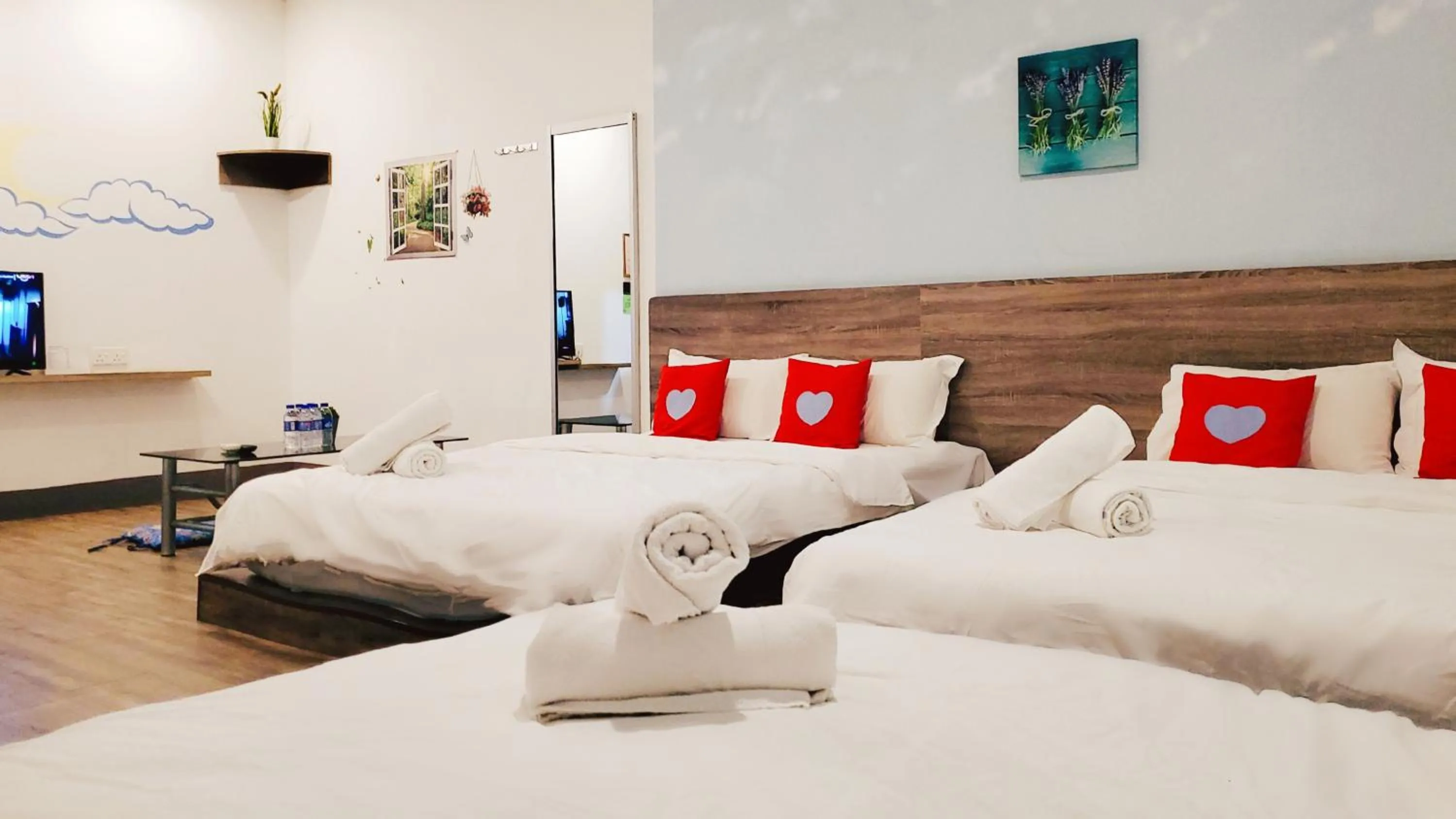 Bed in Winggarden Murals House by JE Boutique Guesthouse