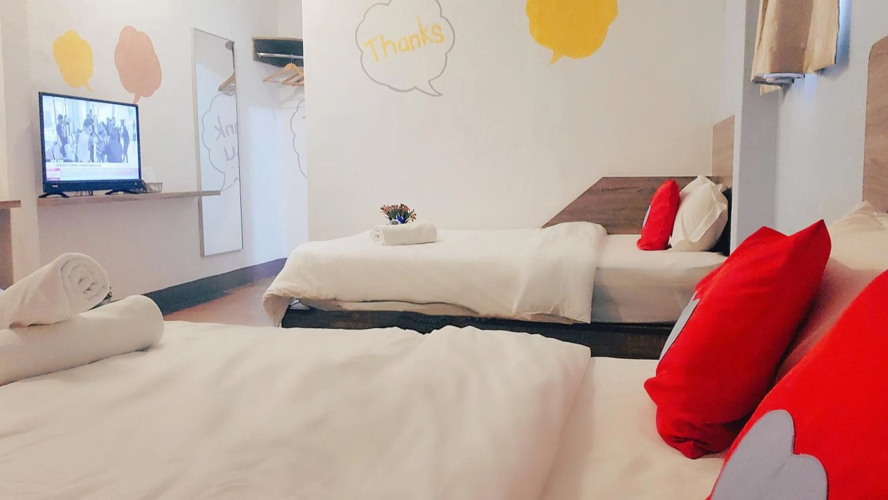 Bed in Winggarden Murals House by JE Boutique Guesthouse