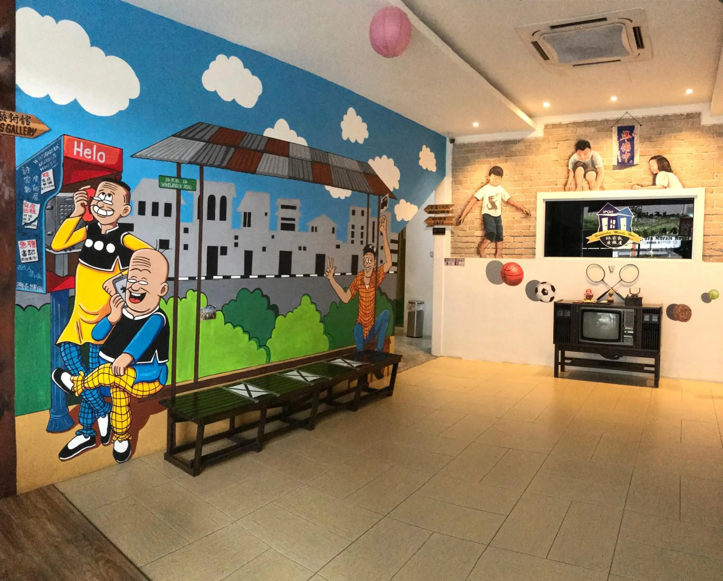 Lobby or reception in Winggarden Murals House by JE Boutique Guesthouse