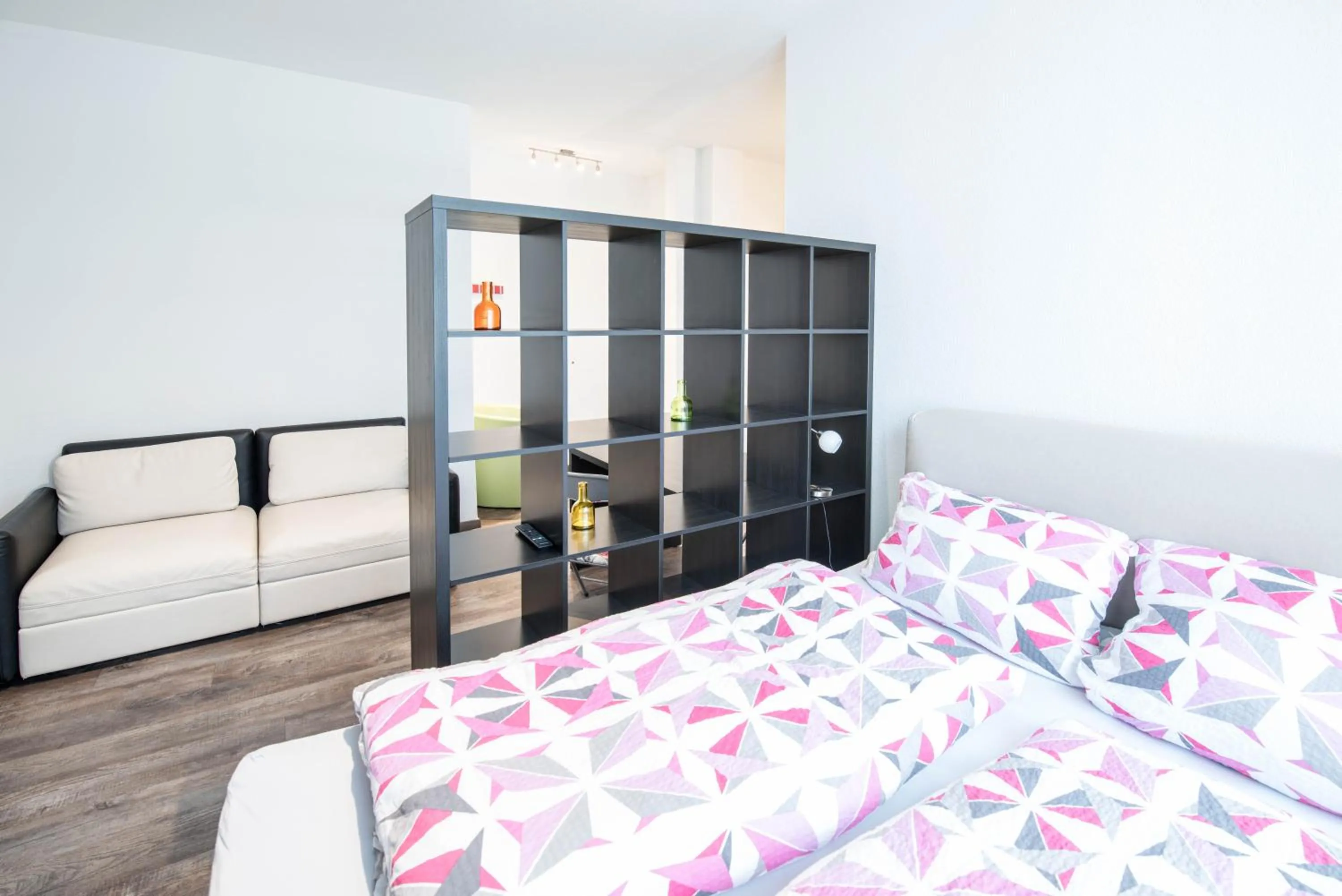 Seating area, Bed in Central Apartments Aalen