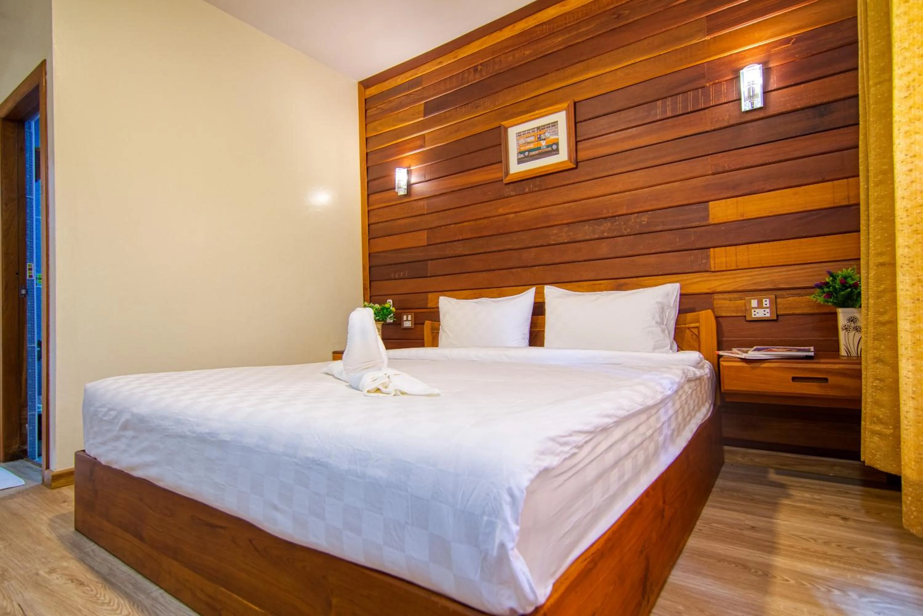 Photo of the whole room, Bed in Nonnee Lampang Hotel