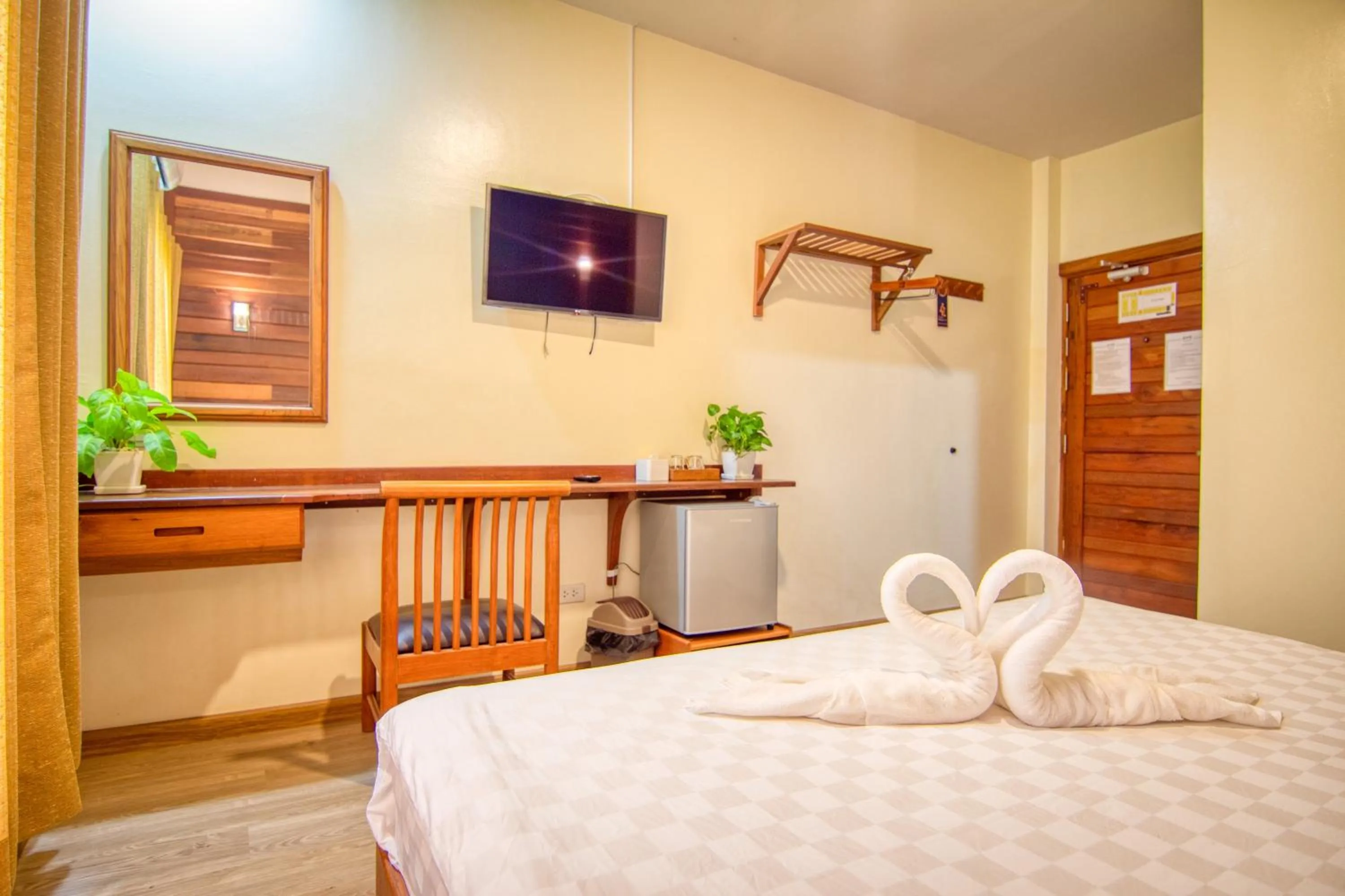 Photo of the whole room, Bed in Nonnee Lampang Hotel