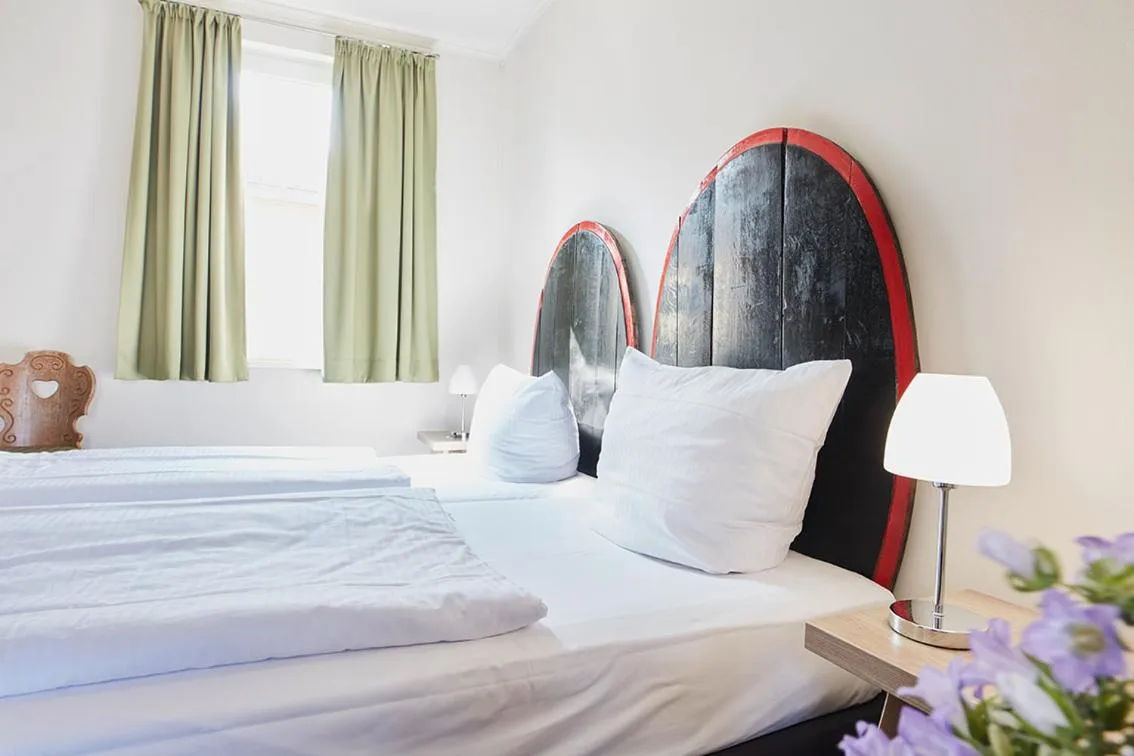 Bed in Hotel Lindenwirt