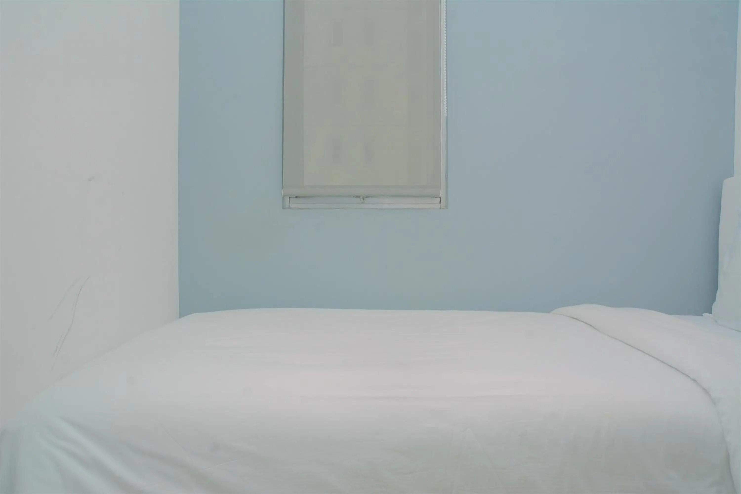 Bed in Best Deal 3BR Apartment Bassura City near Shopping Center By Travelio