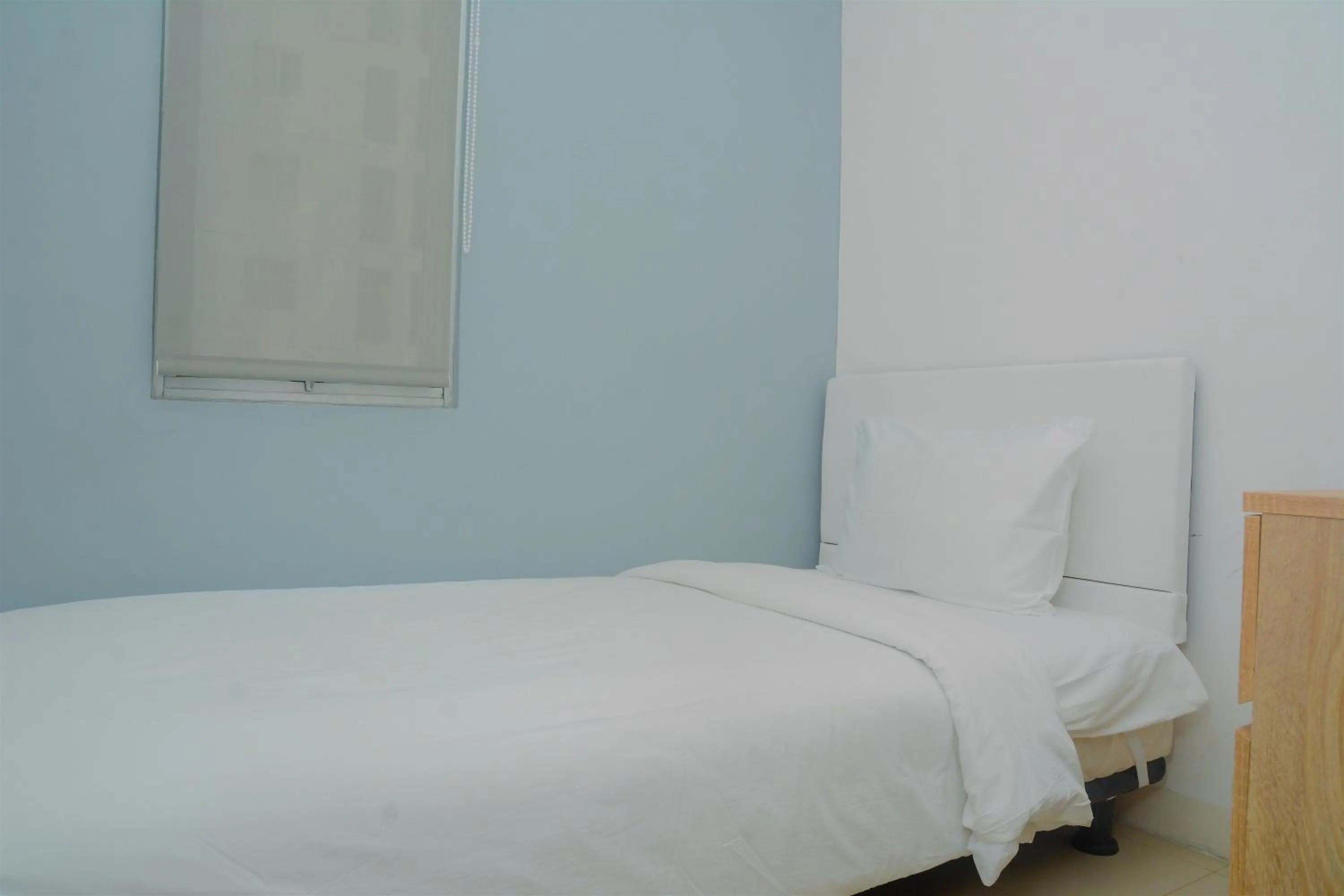 Bed in Best Deal 3BR Apartment Bassura City near Shopping Center By Travelio