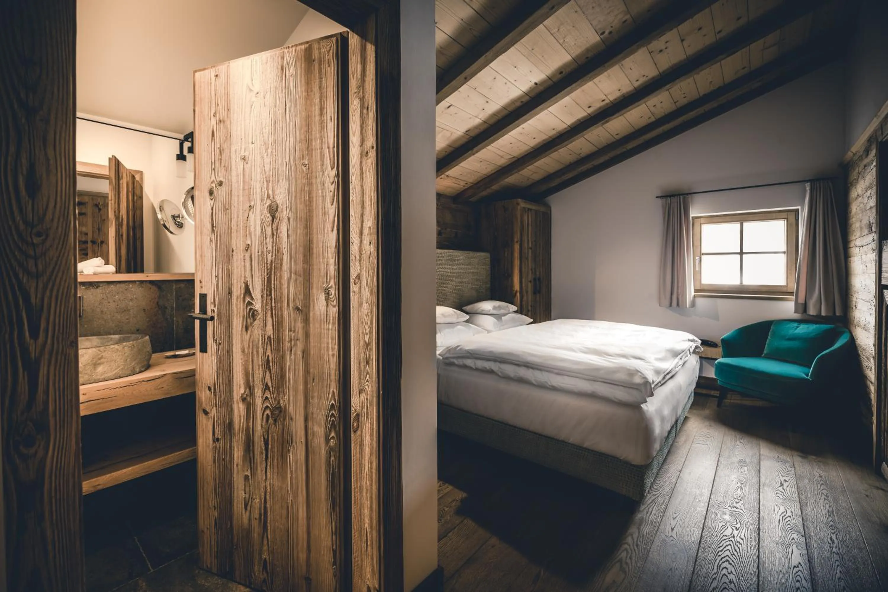 Bed in Relais & Châteaux Gut Steinbach Hotel Chalets SPA