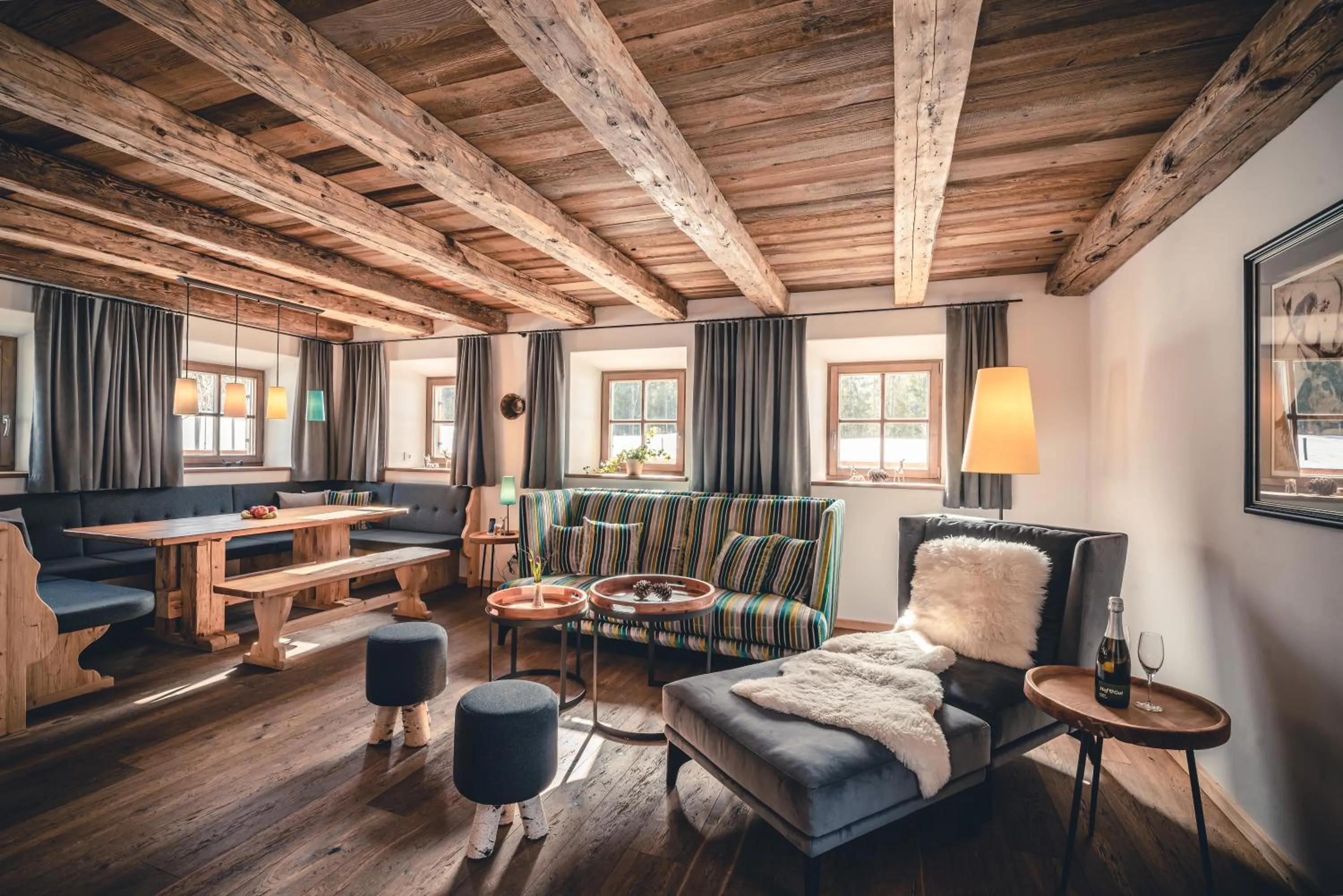 Living room, Bed in Relais & Châteaux Gut Steinbach Hotel Chalets SPA